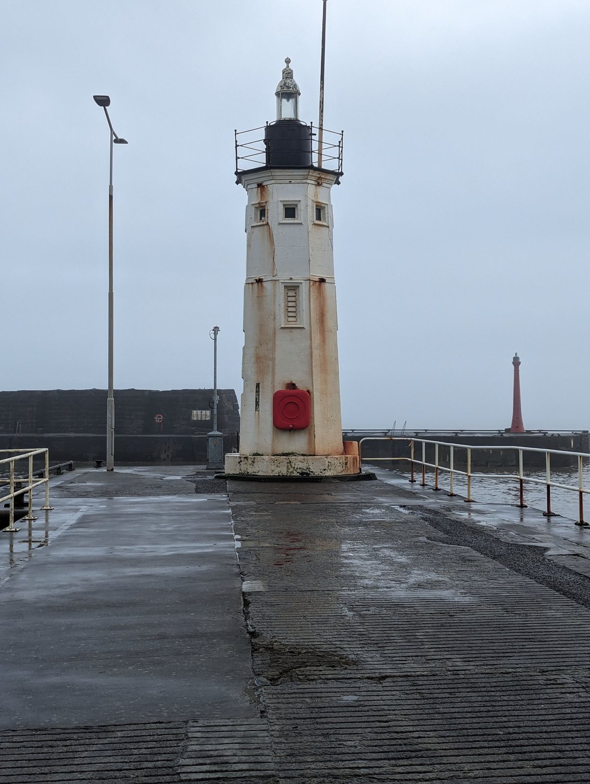 The little white harbour lighthouse on the pier at Anstruther.
