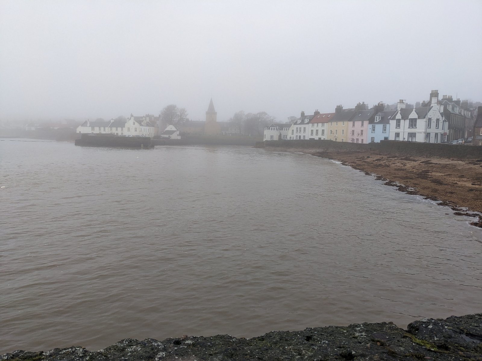 Anstruther harbour fading into sea haar, Fife.