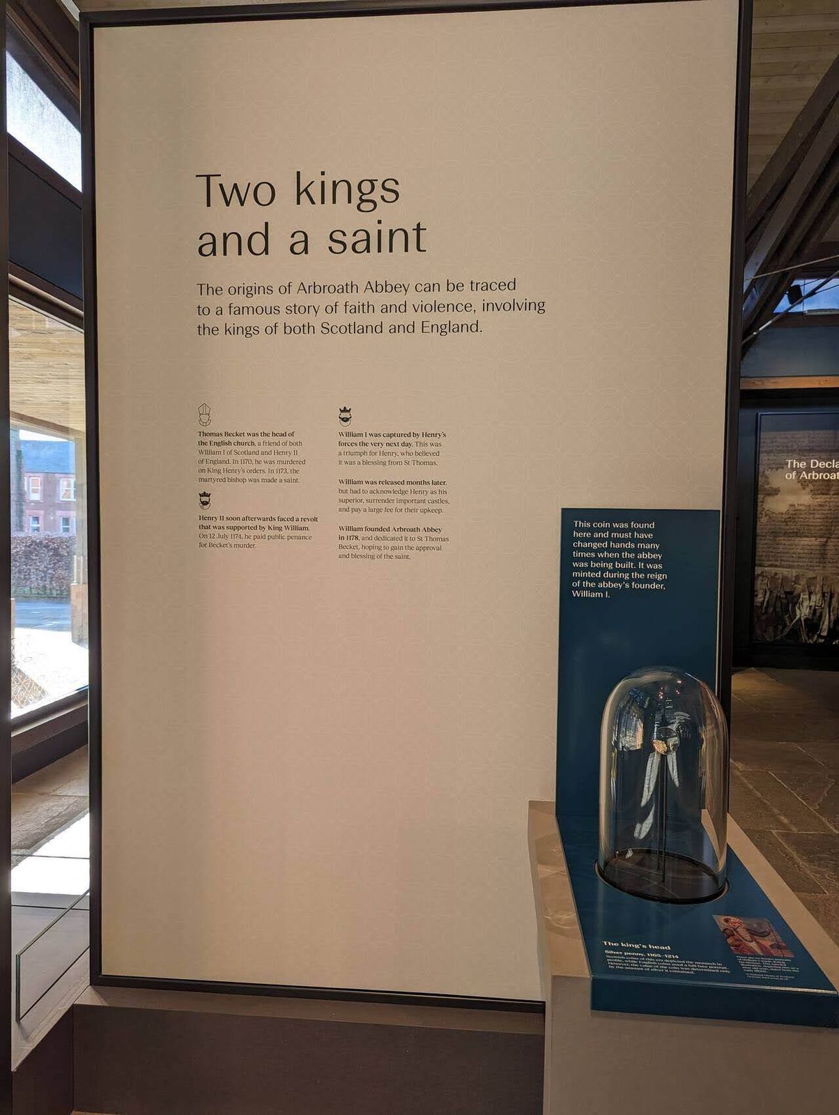 A Two Kings and a Saint display in the Arbroath Abbey visitor centre.