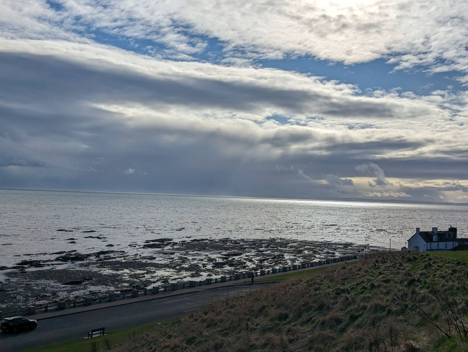 A wide view along the Arbroath coast and bay.