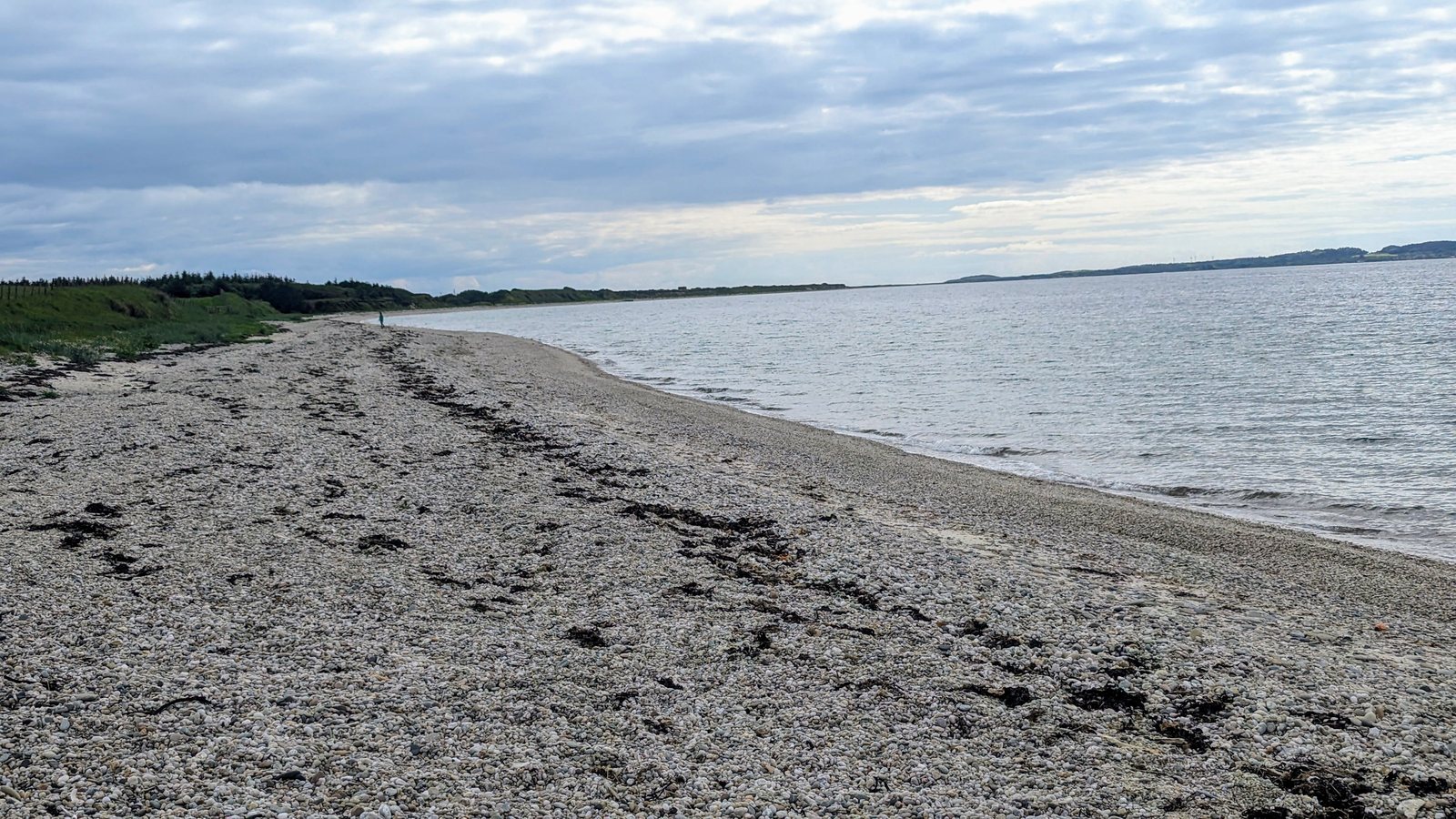 A long shingle beach and spit at Ballochroy, west Kintyre.