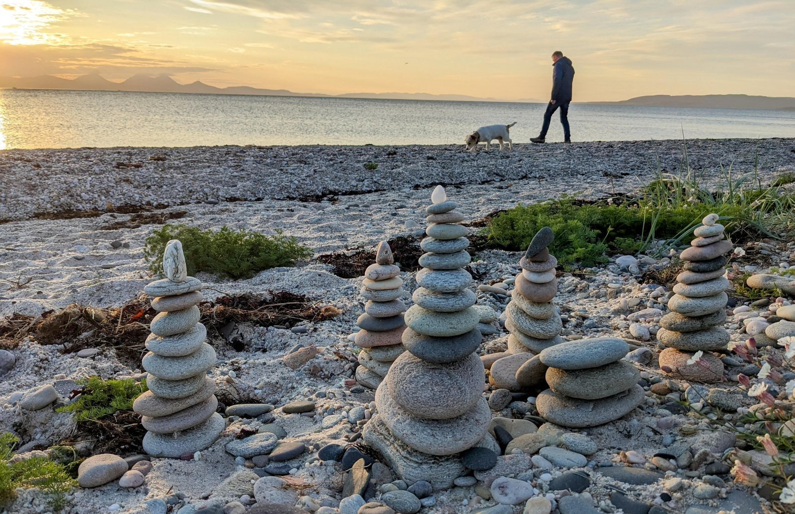 Stacked stones balanced on the shingle beach at Ballochroy.