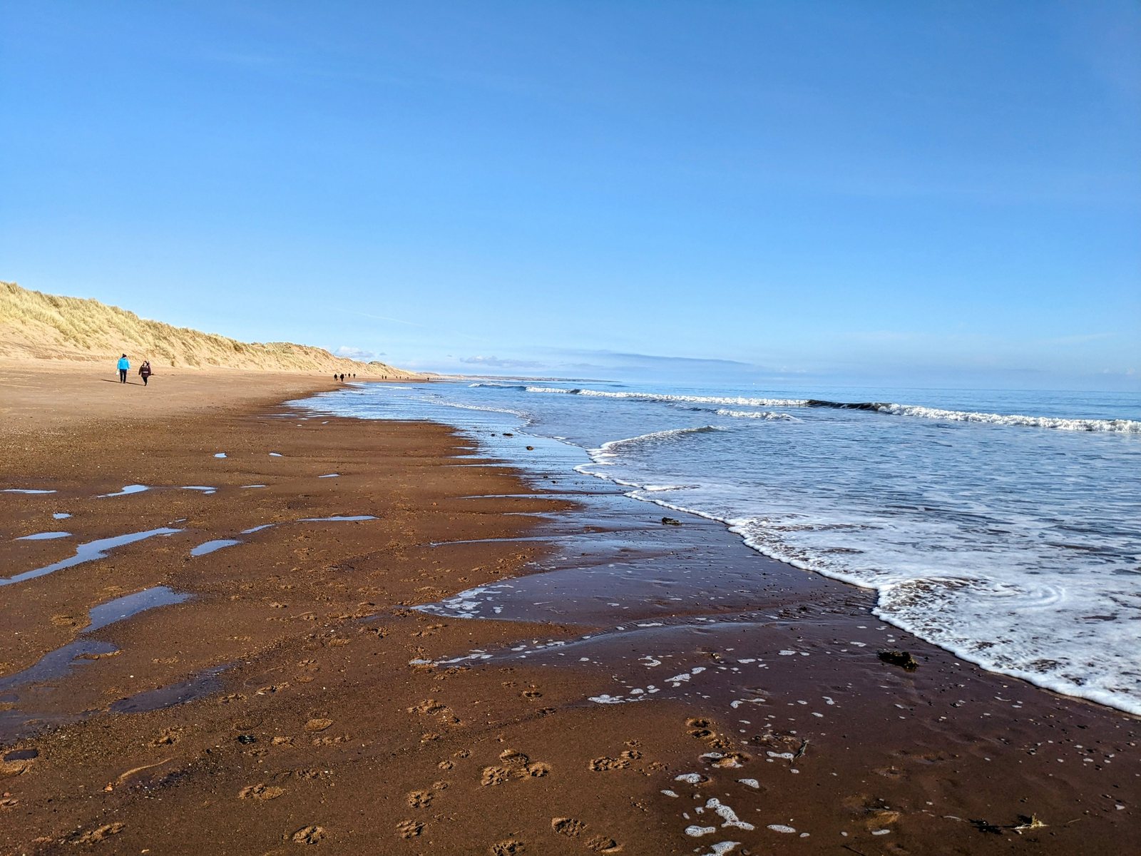 Waves rolling onto the sand at Balmedie.