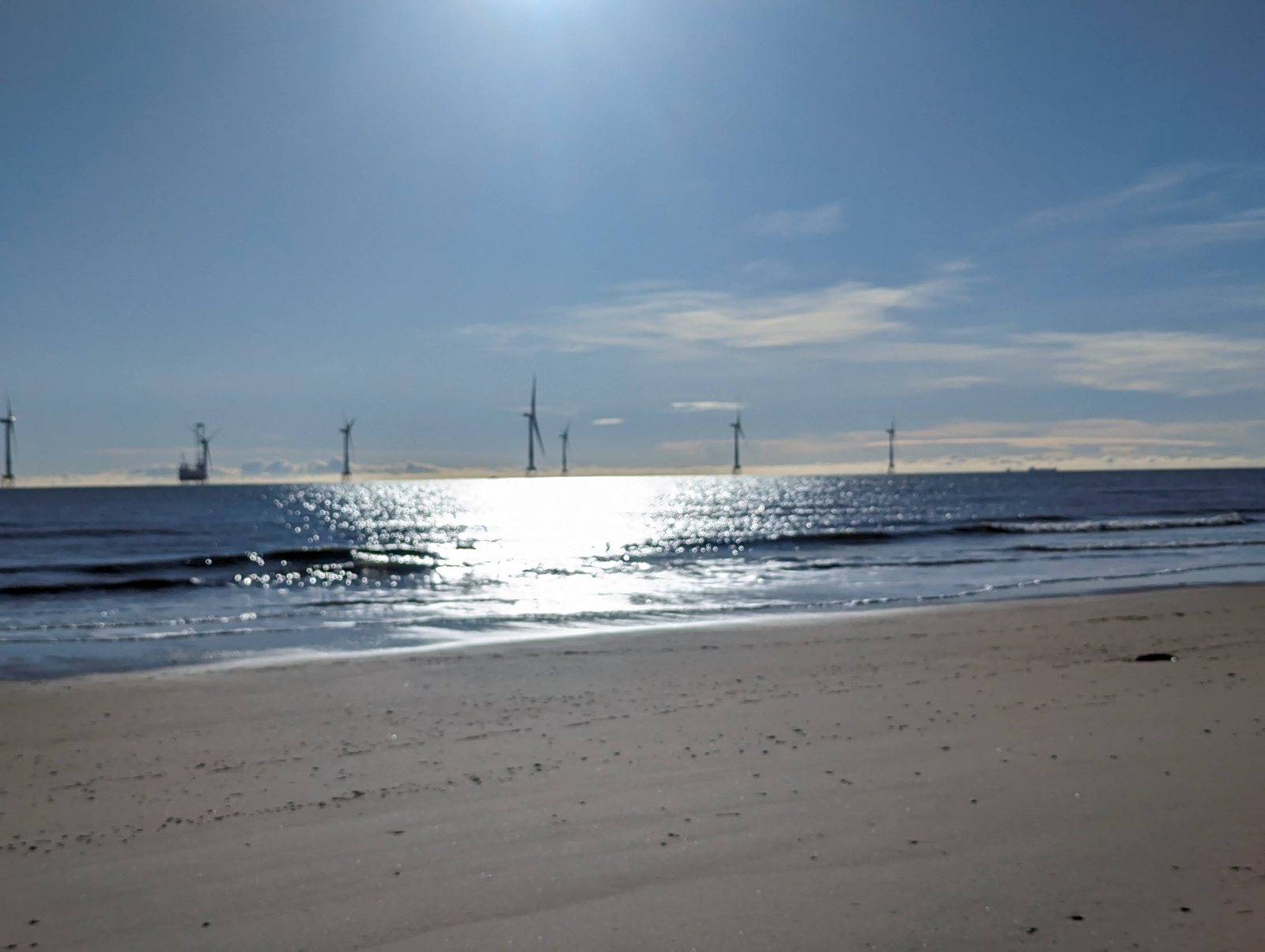The offshore wind farm on the horizon off Balmedie beach.