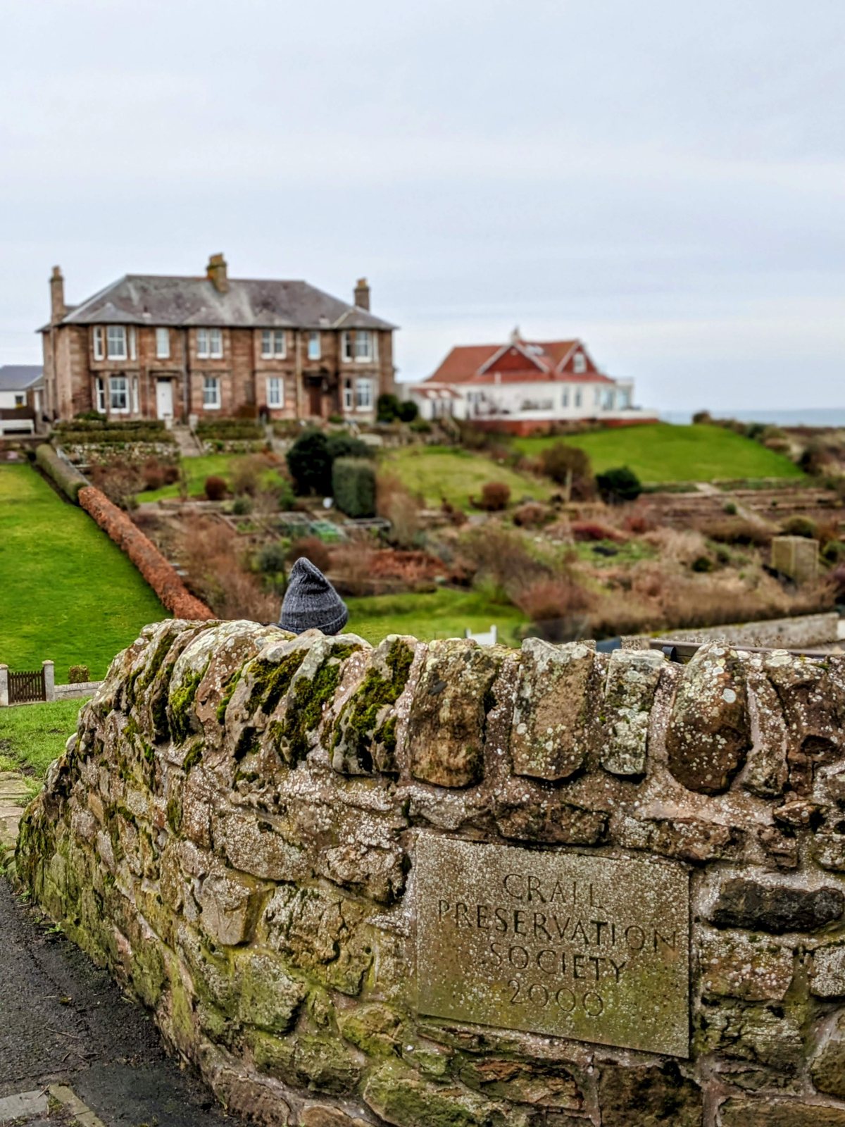 A fine old house and walled garden above the shore at Crail.