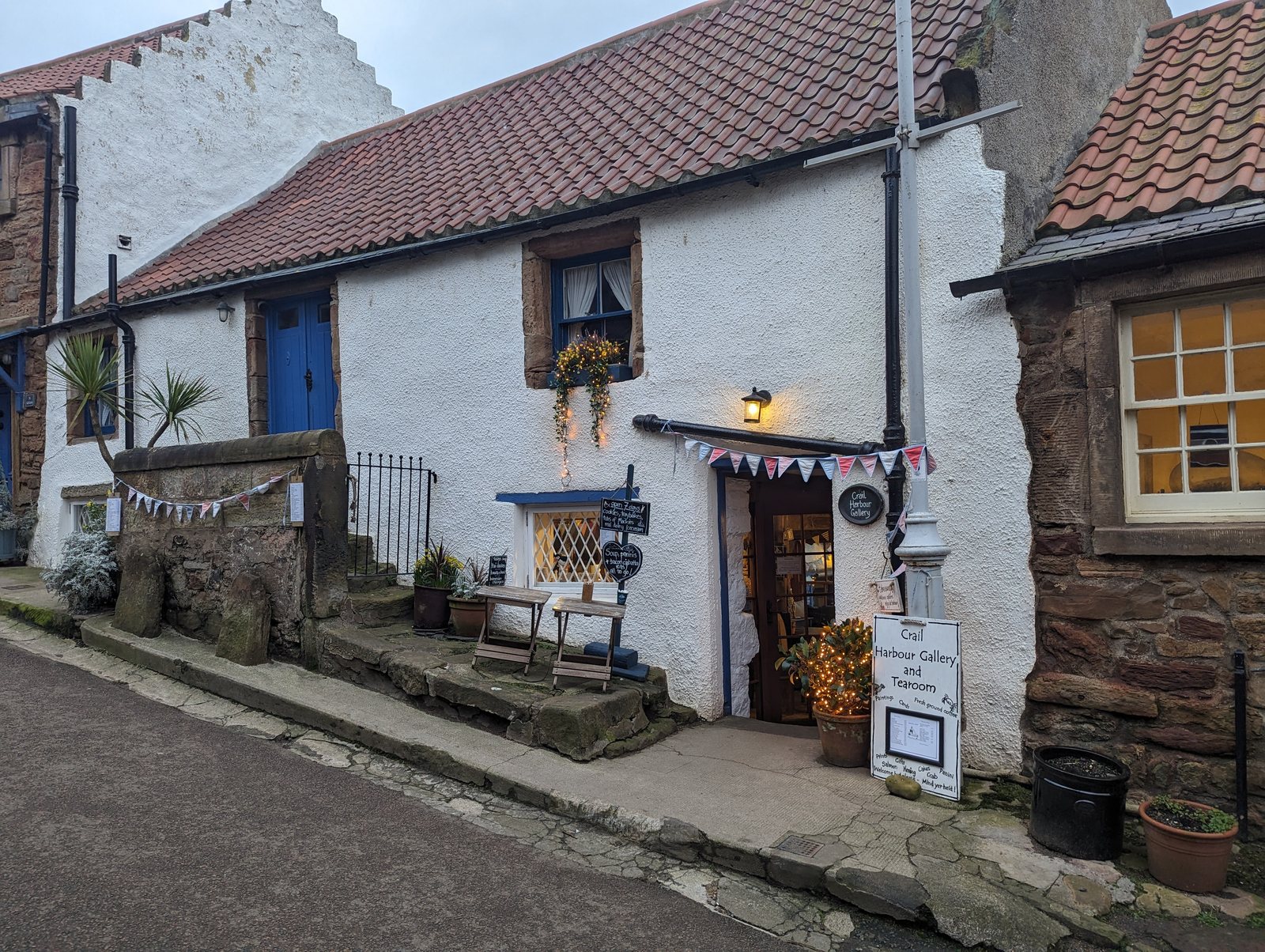A bunting-strung lane of old cottages in Crail.