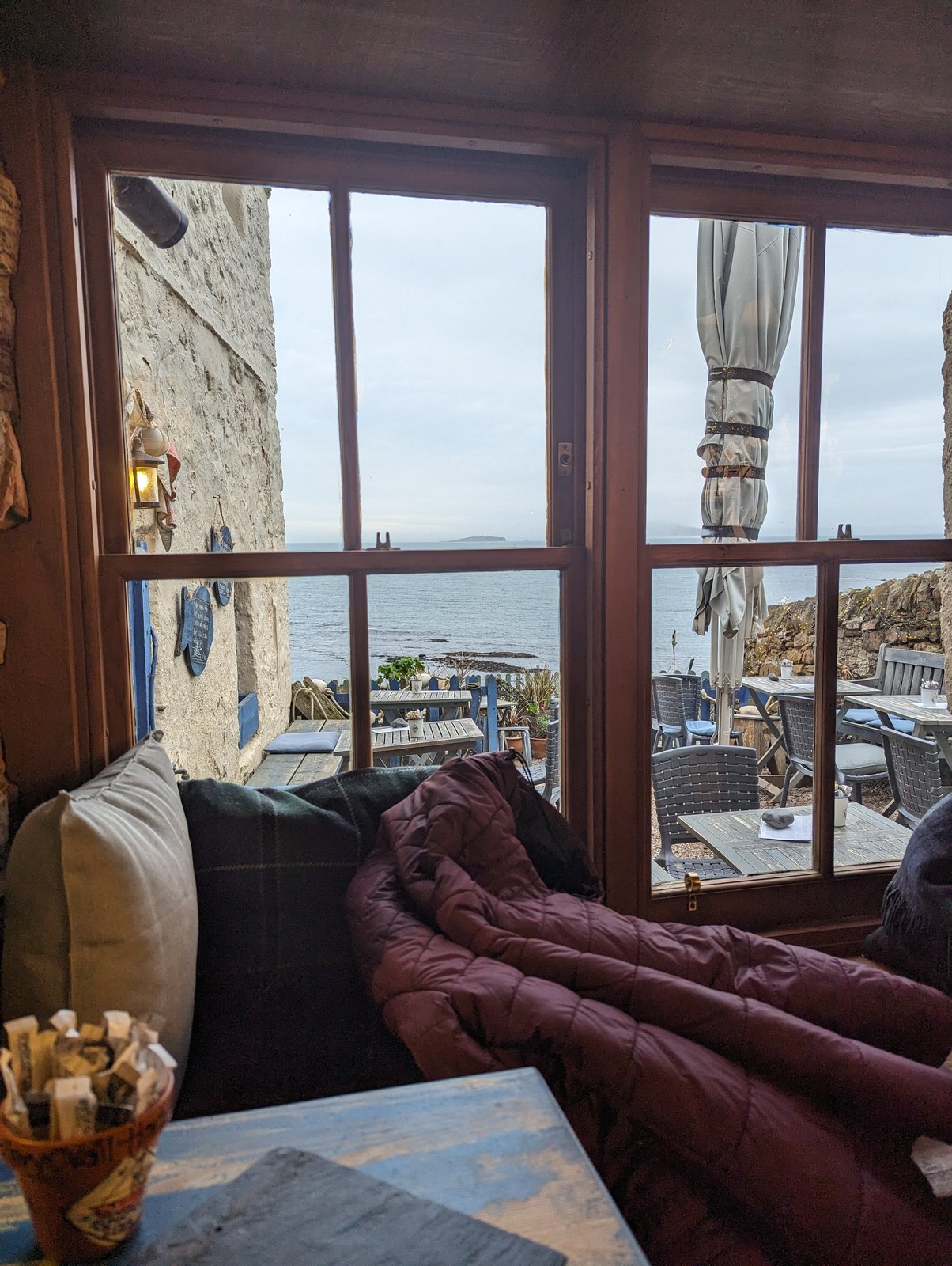 A cosy window seat looking out to sea at the Crail tearoom.