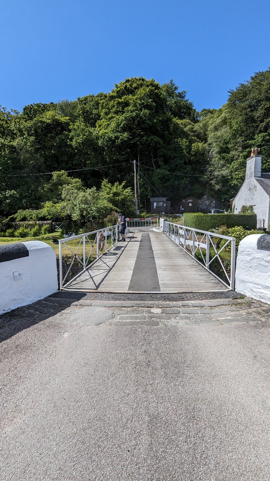 A canal cottage and the road at Crinan.