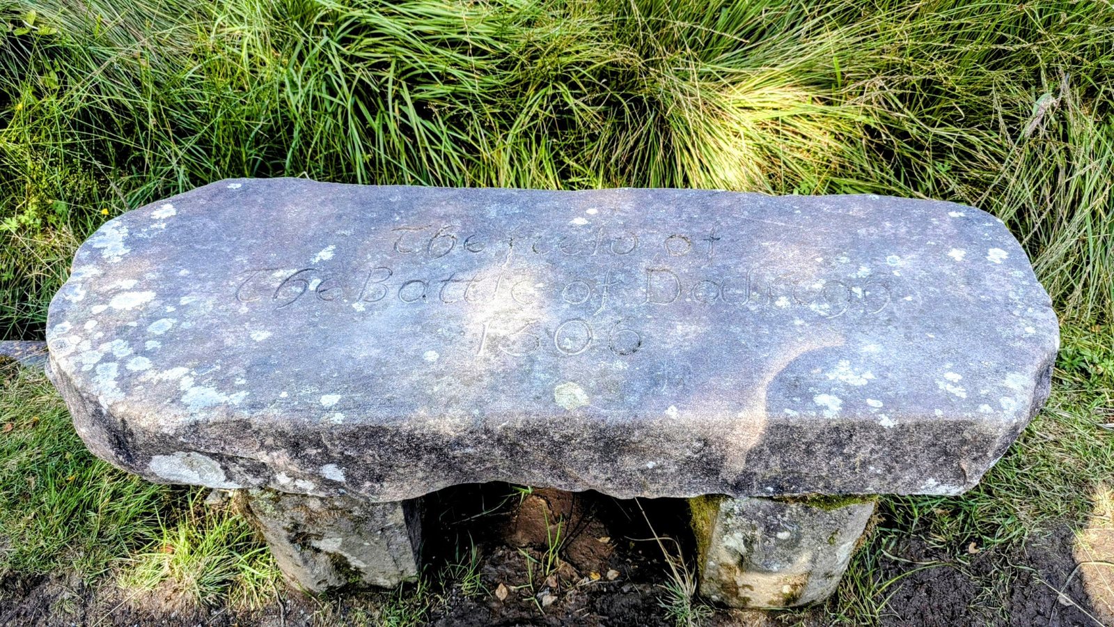 A carved stone bench on the path at Dalrigh