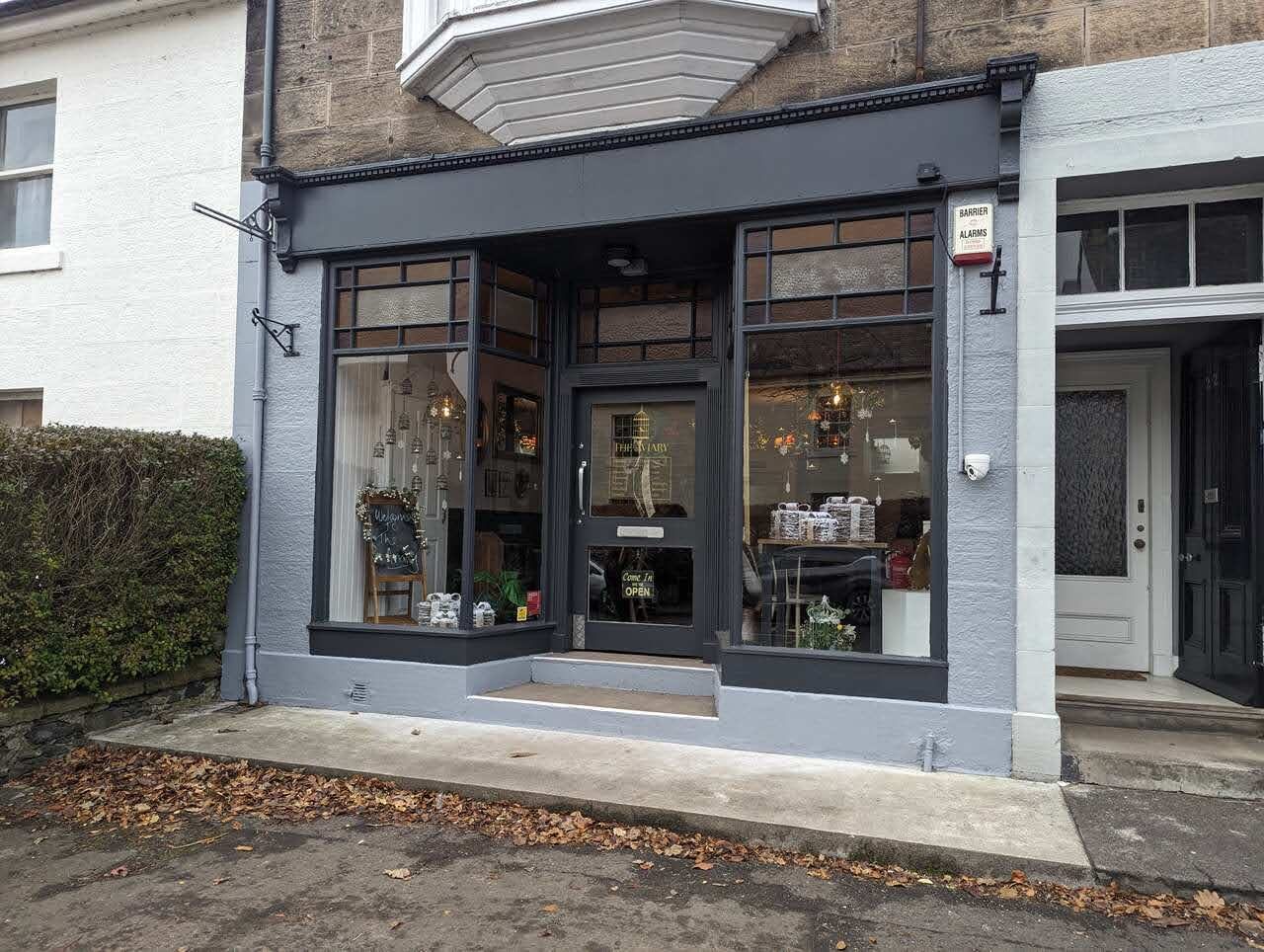 An independent shopfront on the high street in Dollar.