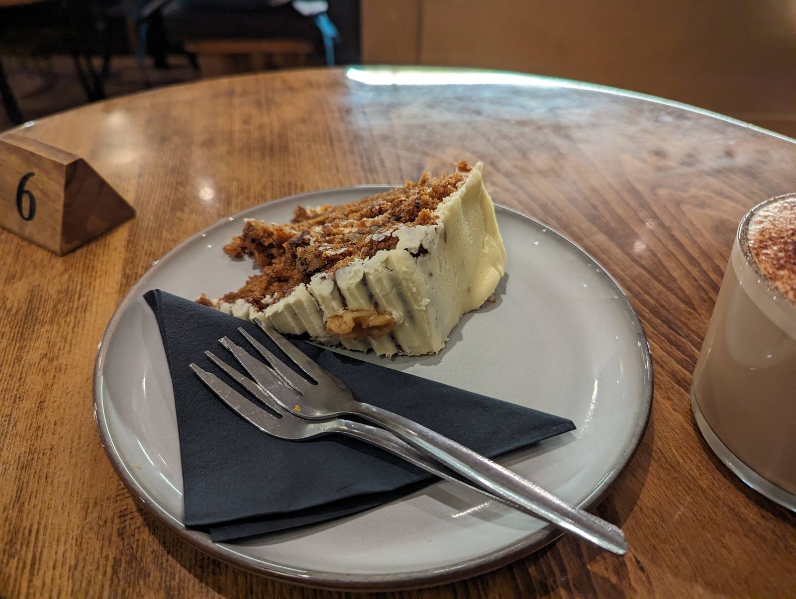 Coffee and a slice of carrot cake at a cafe in Dunbar.