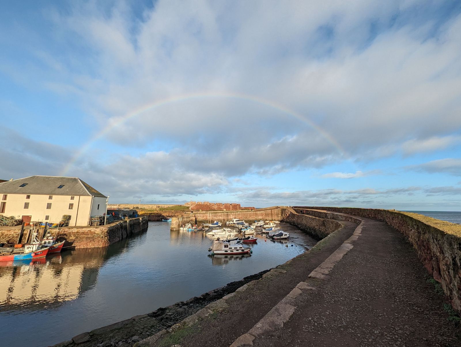 A rainbow over Dunbar harbour and the fishing boats.