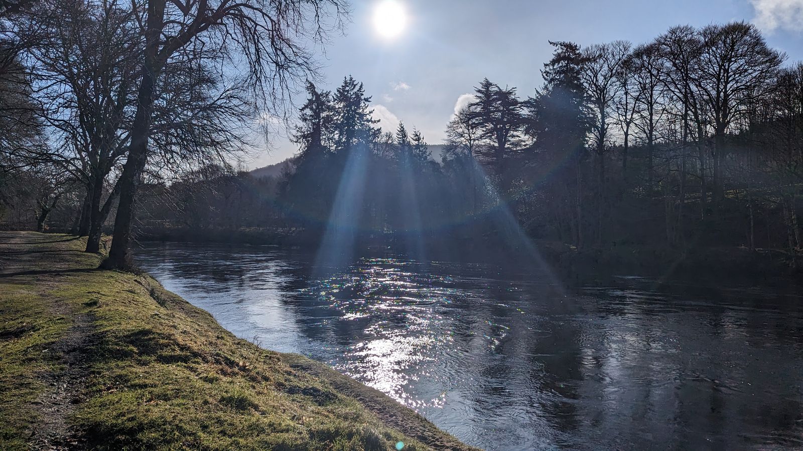 The River Tay running past Dunkeld with a low winter sun.