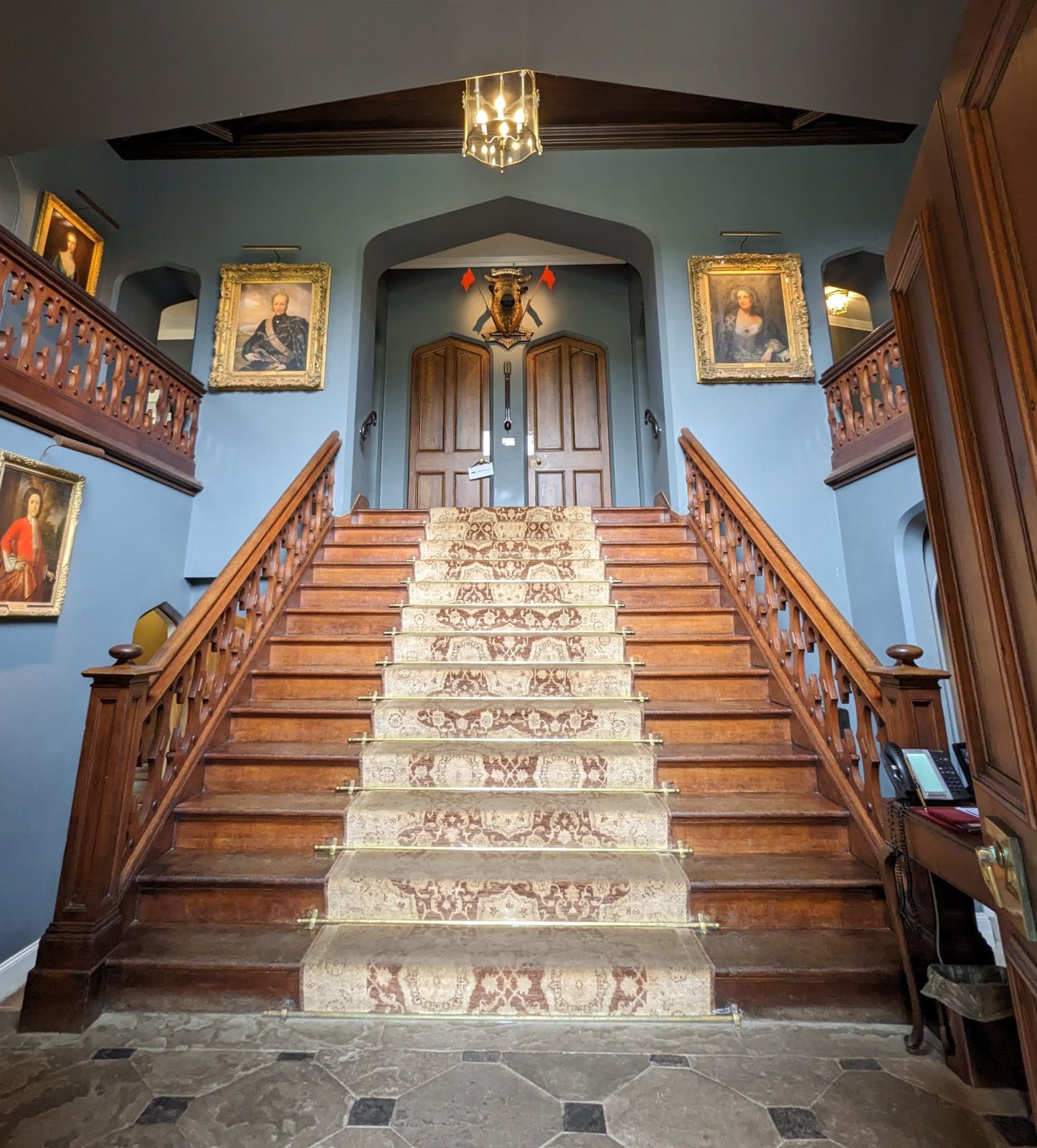 The grand staircase inside Dunvegan Castle.