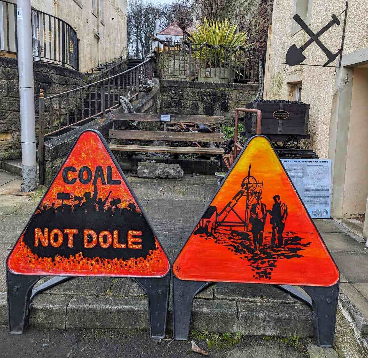 A Coal Not Dole sign recalling the coal-mining heritage of East Wemyss.
