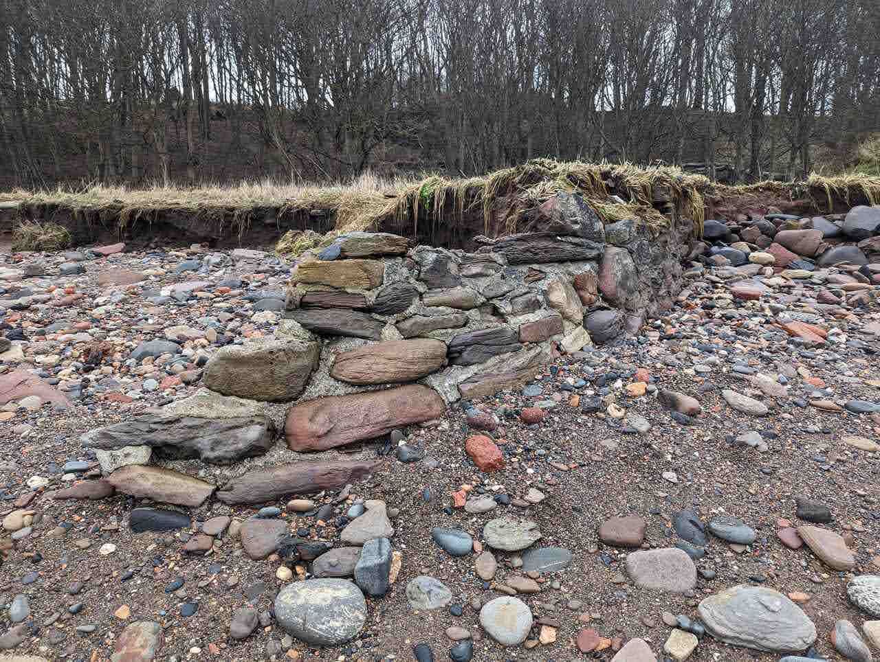 The red sandstone foreshore at East Wemyss at low tide.