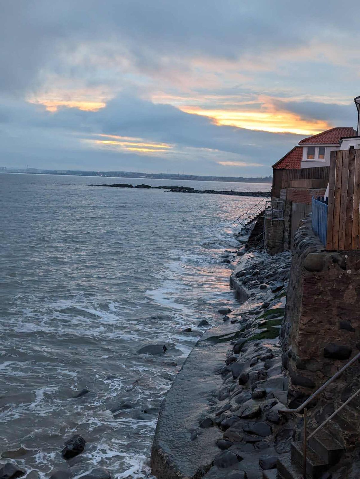 A wintry sunset over the red sandstone shore at East Wemyss.