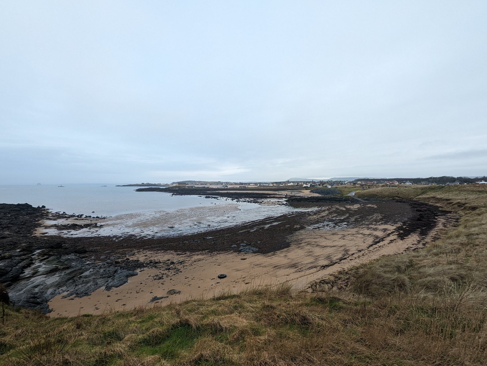 Old volcanic rock along the shore at Elie Ness.