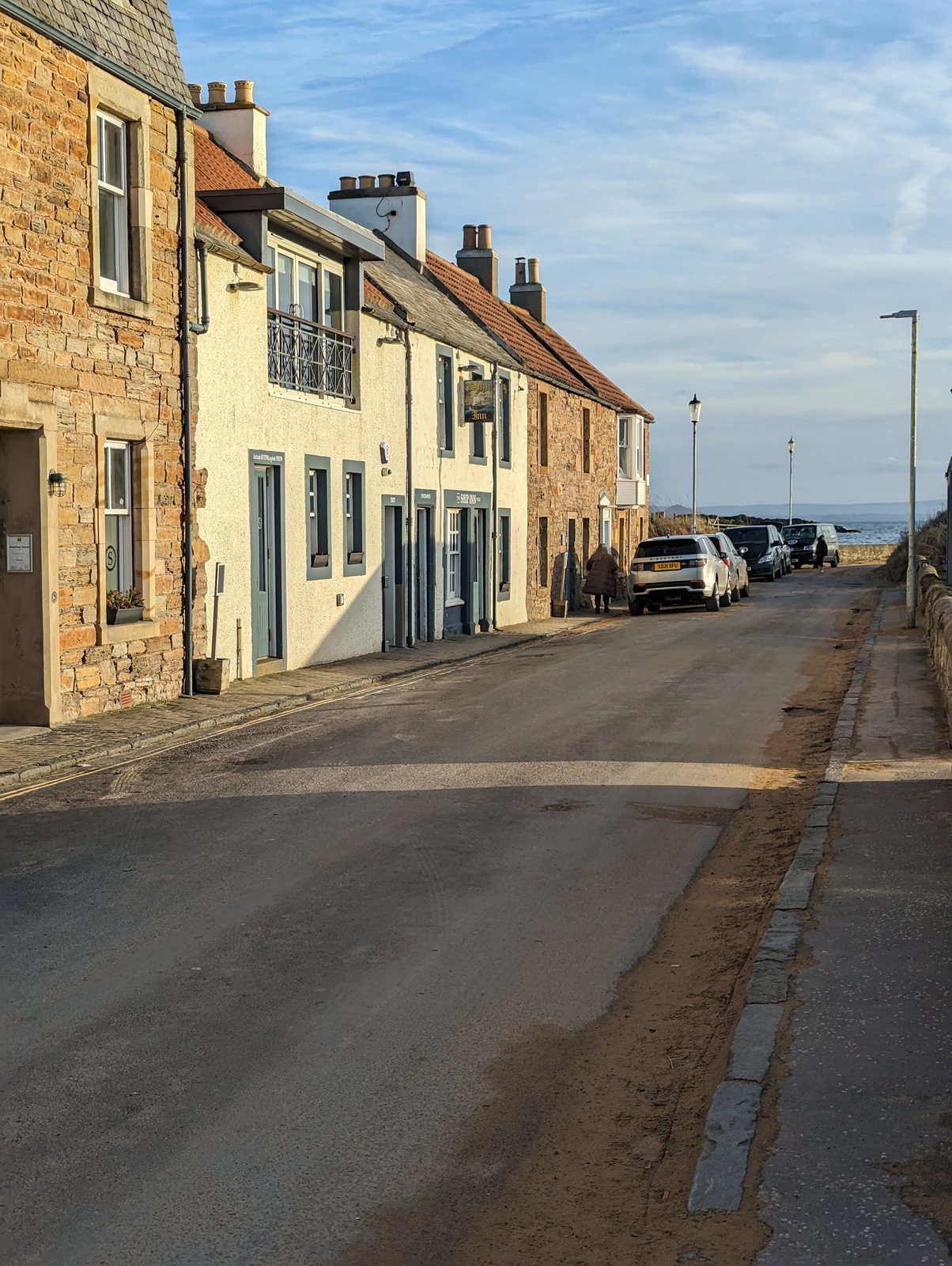 A street of white-washed houses in Elie.