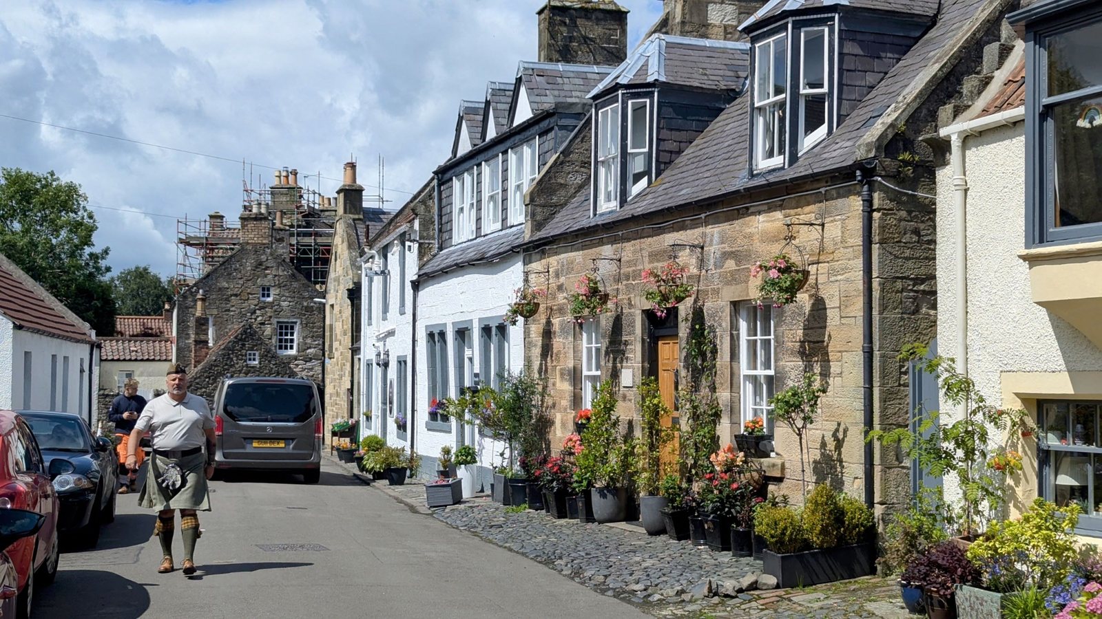 A street of old stone cottages in Falkland village.
