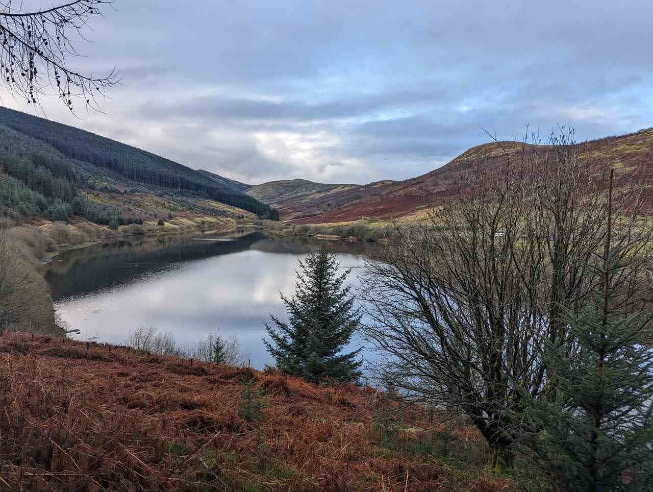 A Glendevon reservoir below the russet Ochil hillsides.