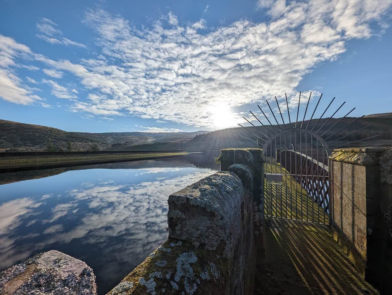 The dam walkway across a Glendevon reservoir in the Ochil Hills.