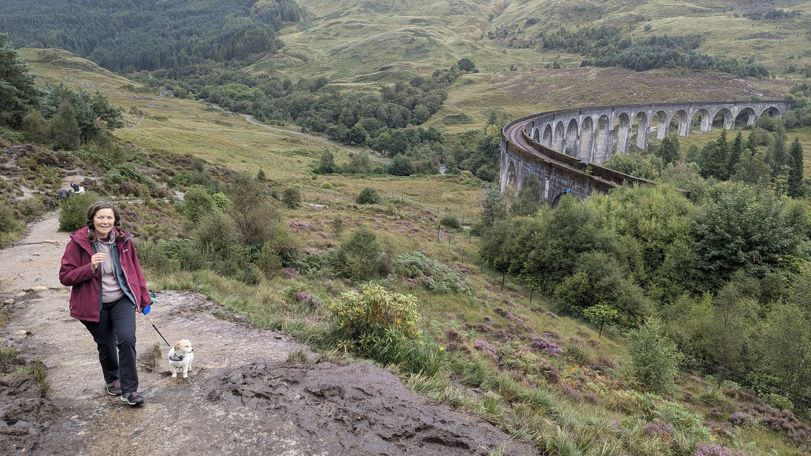Walkers on the path to the Glenfinnan Viaduct viewpoint.
