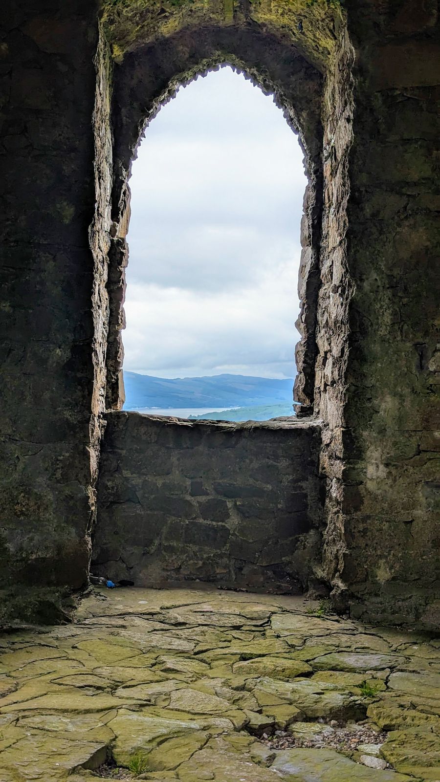 Loch Fyne framed through the Gothic window of the Dun na Cuaiche folly