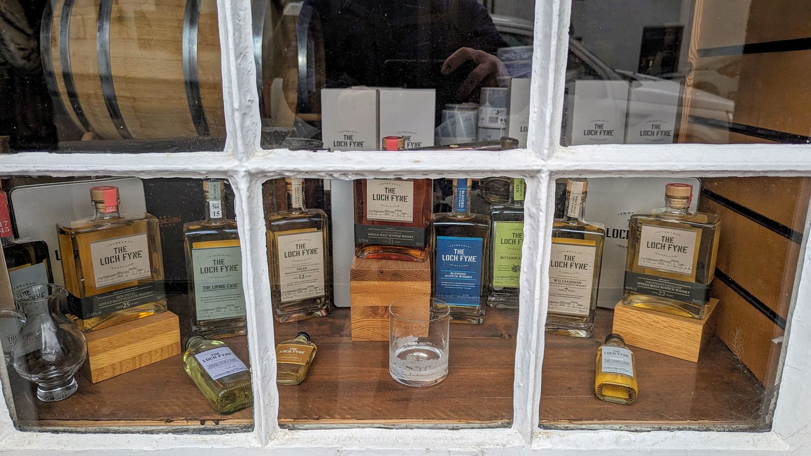 Malt whiskies in the window of Loch Fyne Whiskies, Inveraray