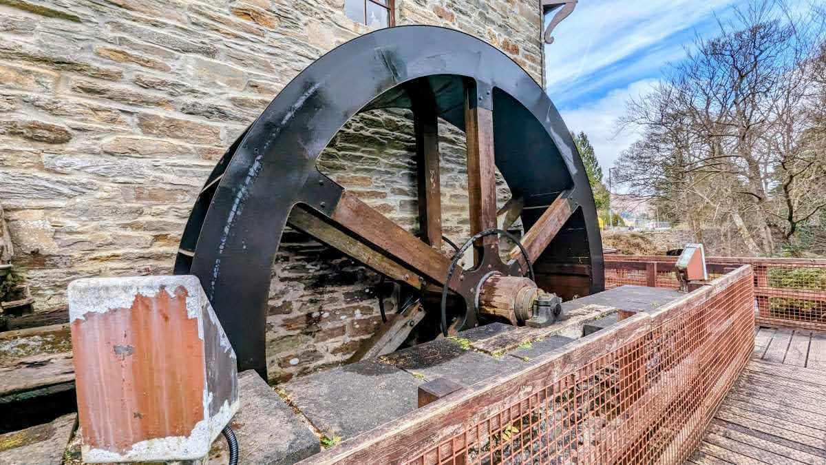 The large iron water wheel at the old mill by the Falls of Dochart in Killin, still working.