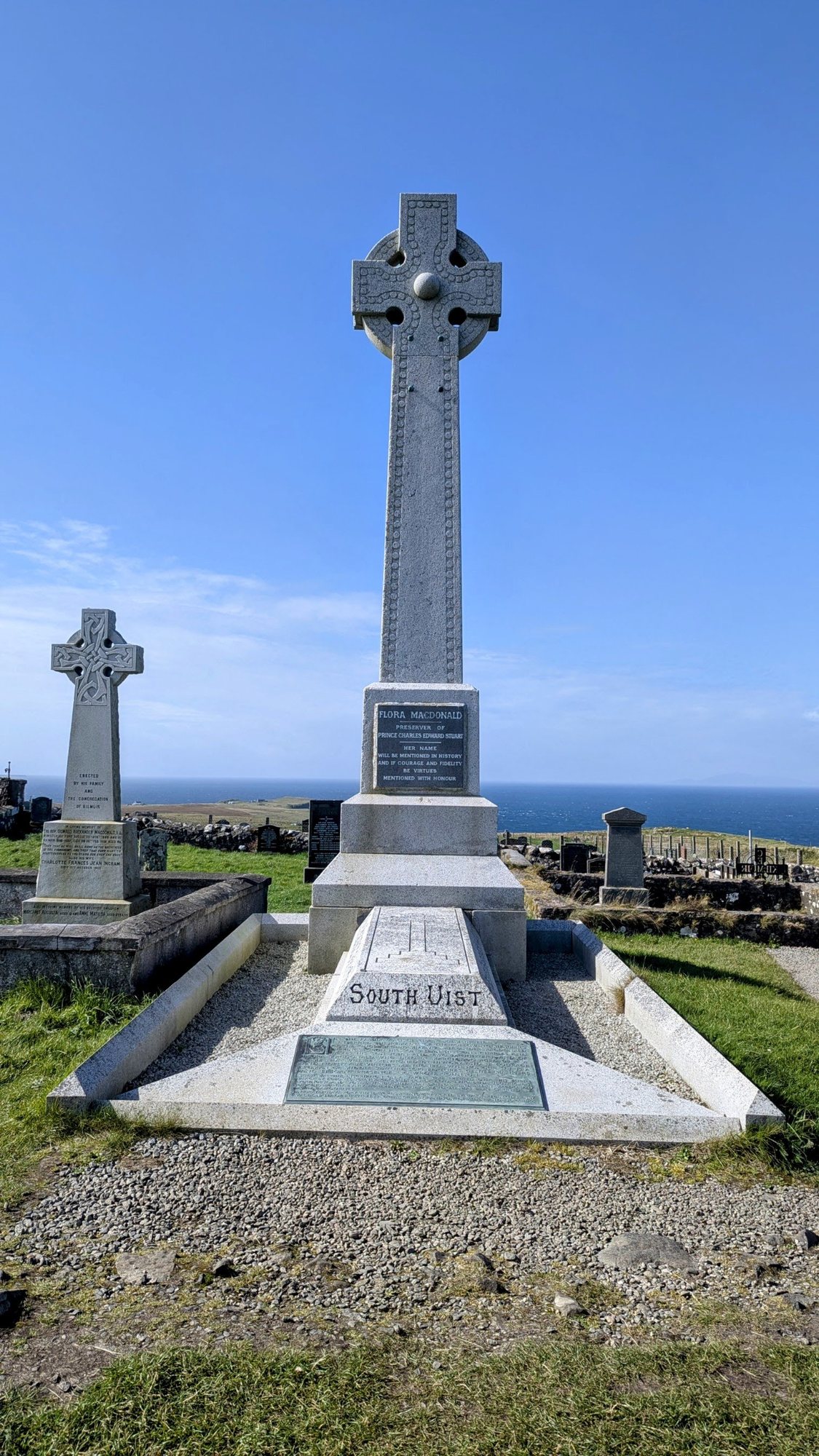 The tall Celtic-cross monument over Flora MacDonald's grave at Kilmuir, Skye.