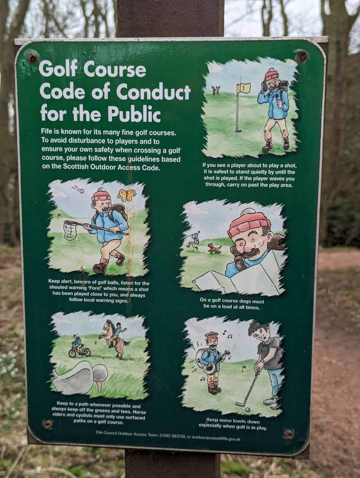 A Golf Course Code of Conduct sign for walkers crossing Kingsbarns Golf Links.
