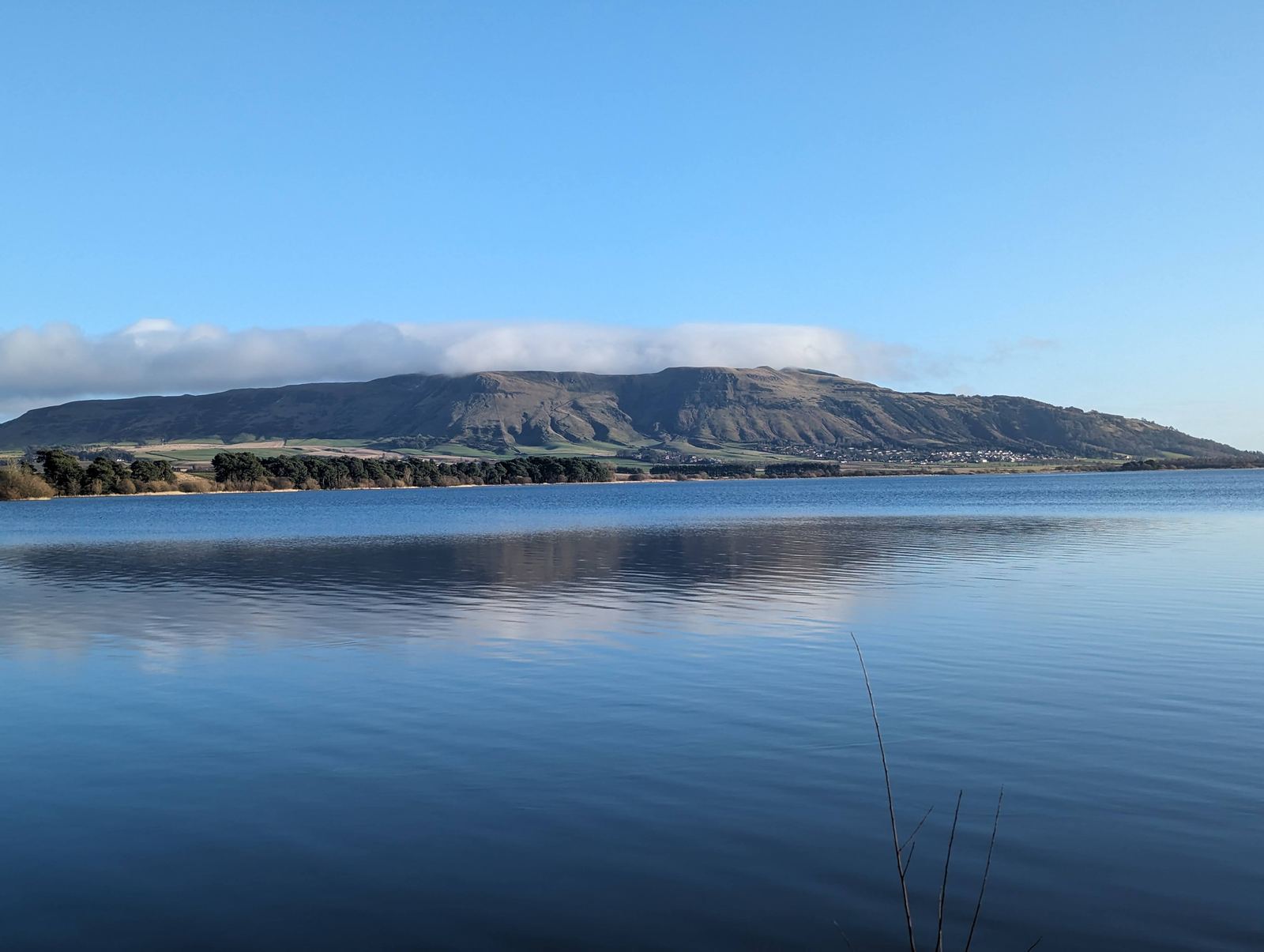 Loch Leven with the Lomond Hills rising blue across the water