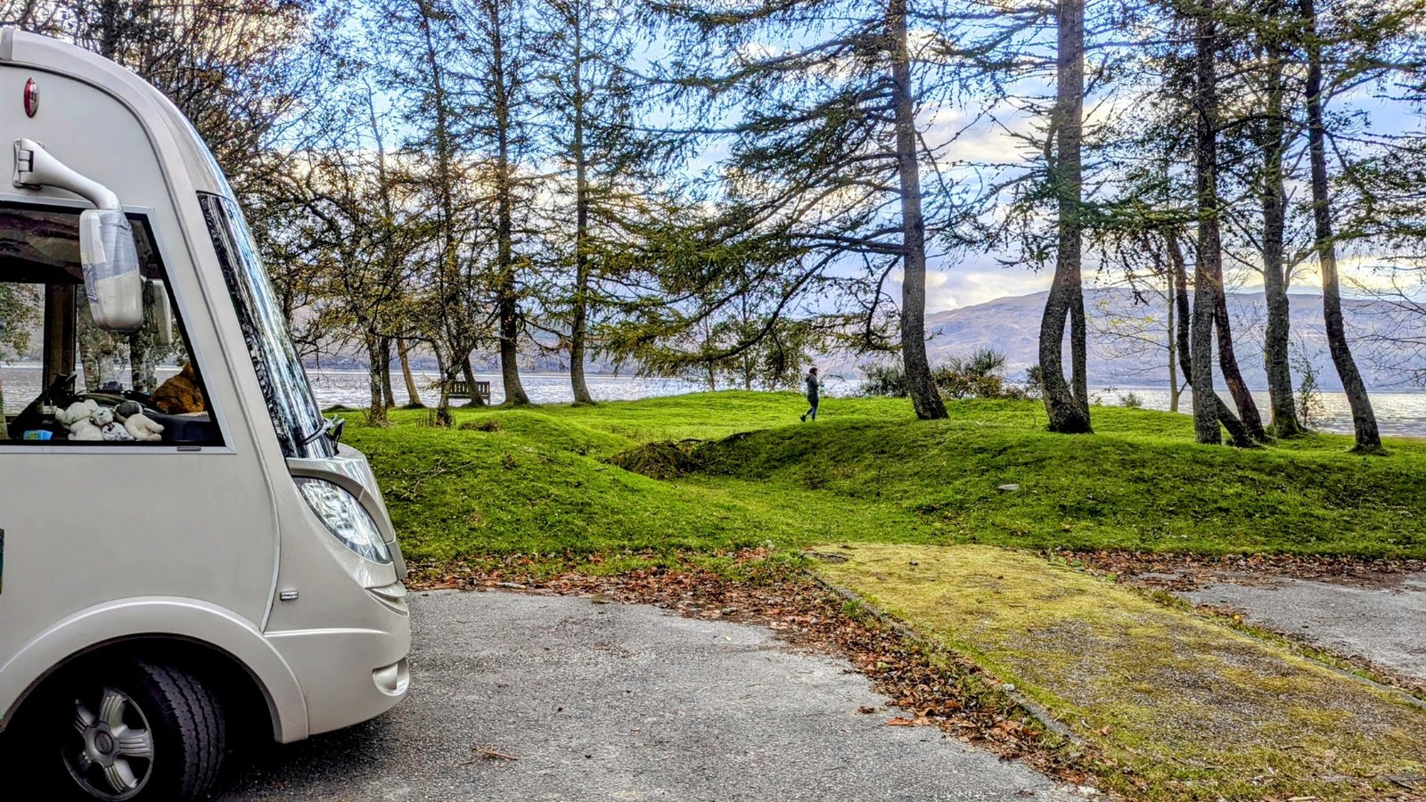 A motorhome parked by Loch Carron.