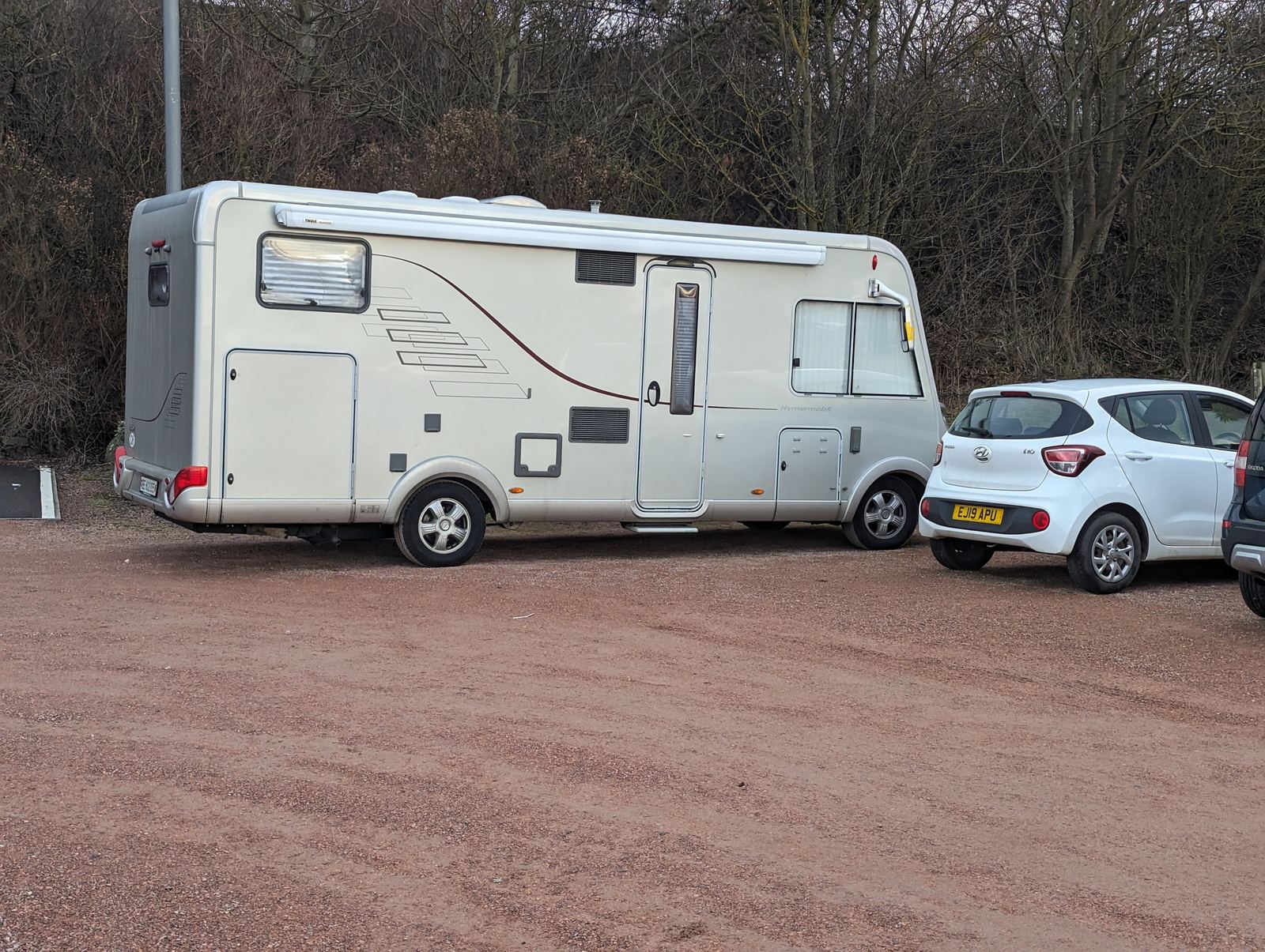 A motorhome parked in the small seafront car park at Lower Largo
