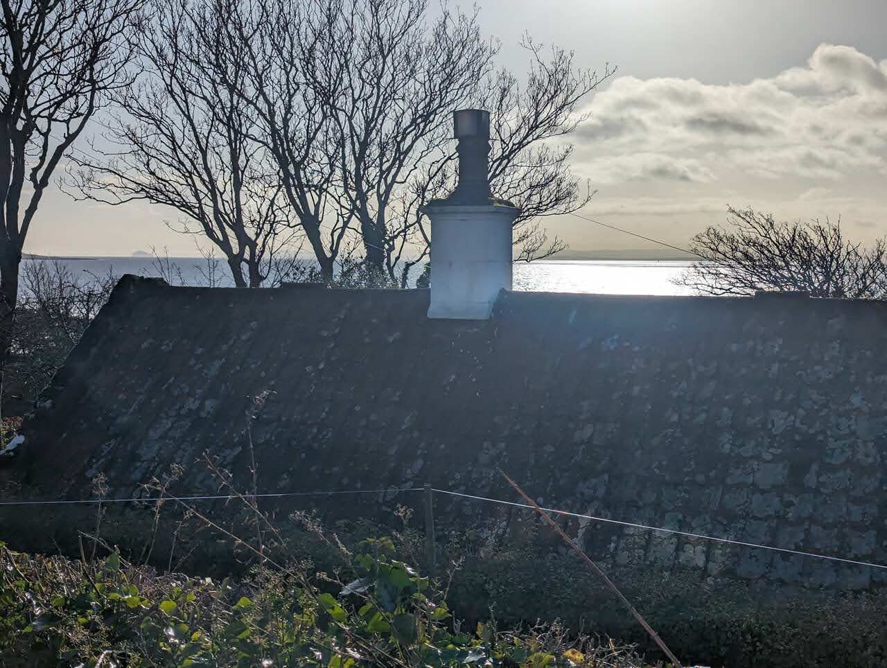 Old Seatown cottages at Lower Largo with the sea beyond