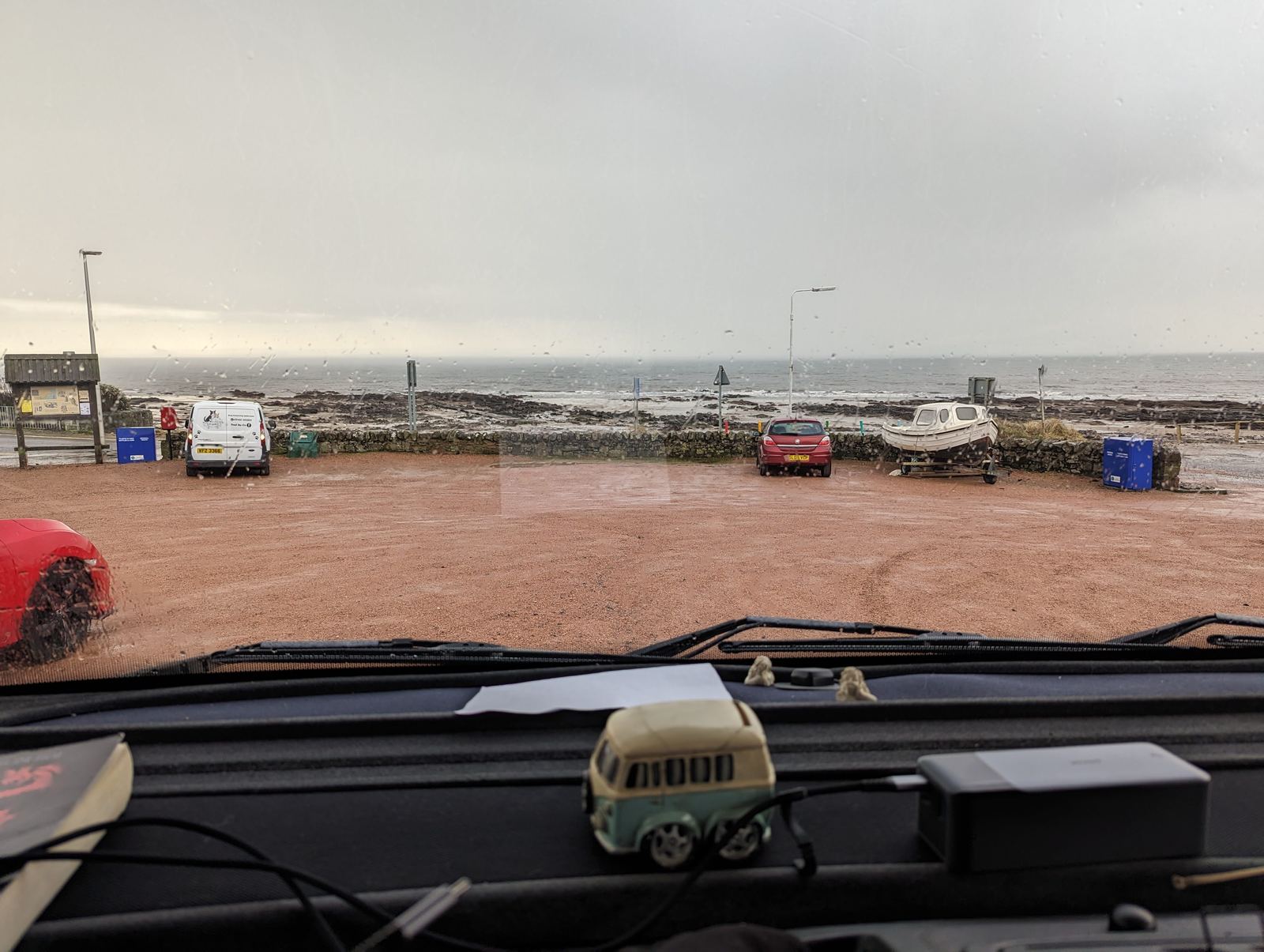 The morning view over the car park and sea from the campervan at Lower Largo