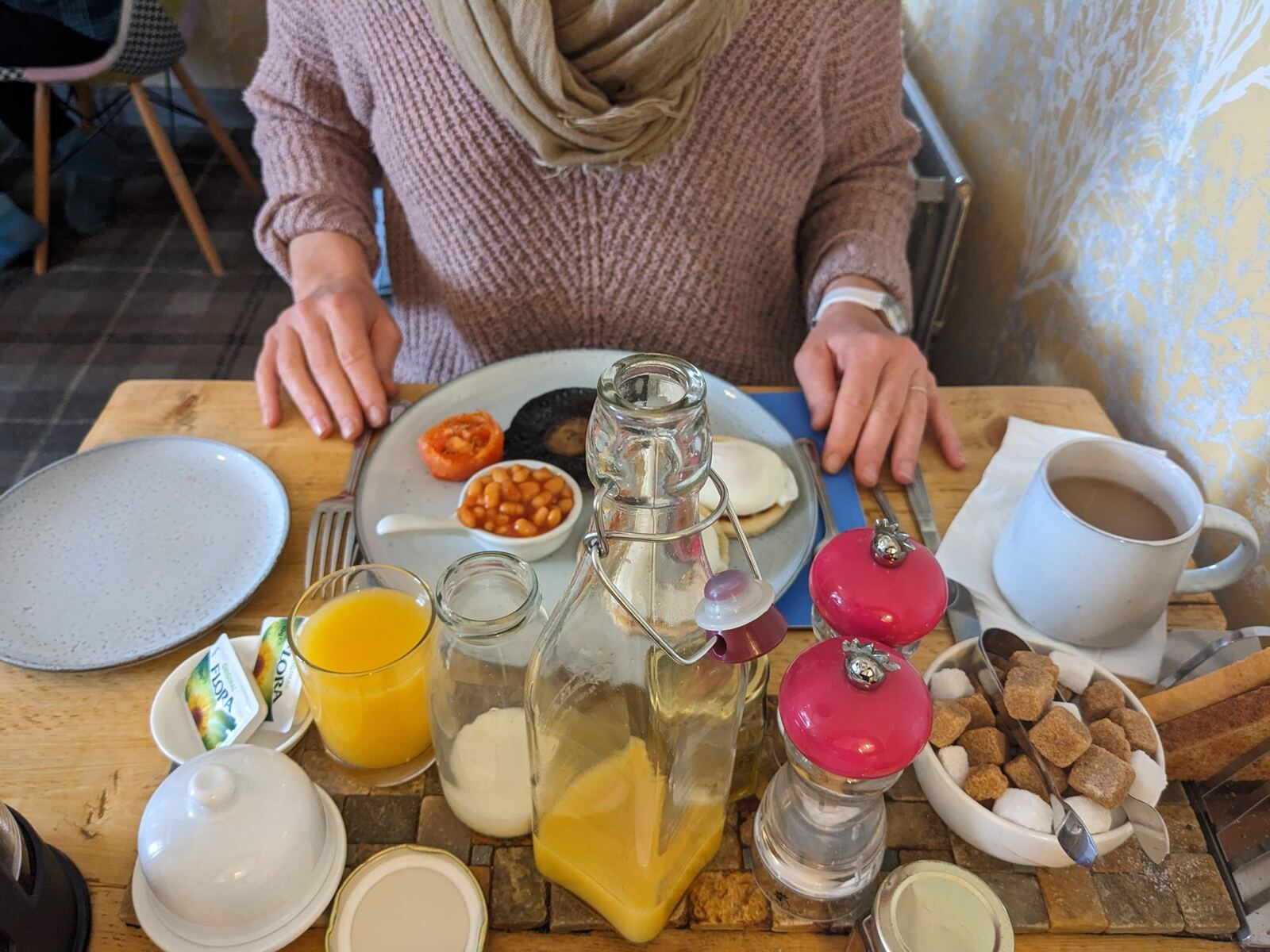 A cooked breakfast laid out on a wooden tray at a Balloch B&B.