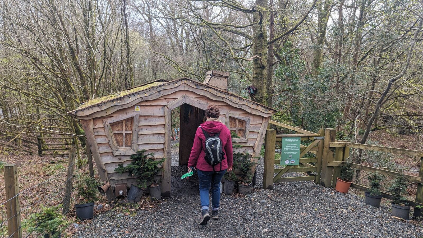 A small wooden fairy house among the trees on the Loch Lomond fairy trail at Luss.
