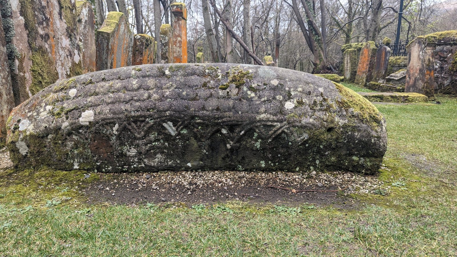 An ancient carved grave slab in Luss churchyard.