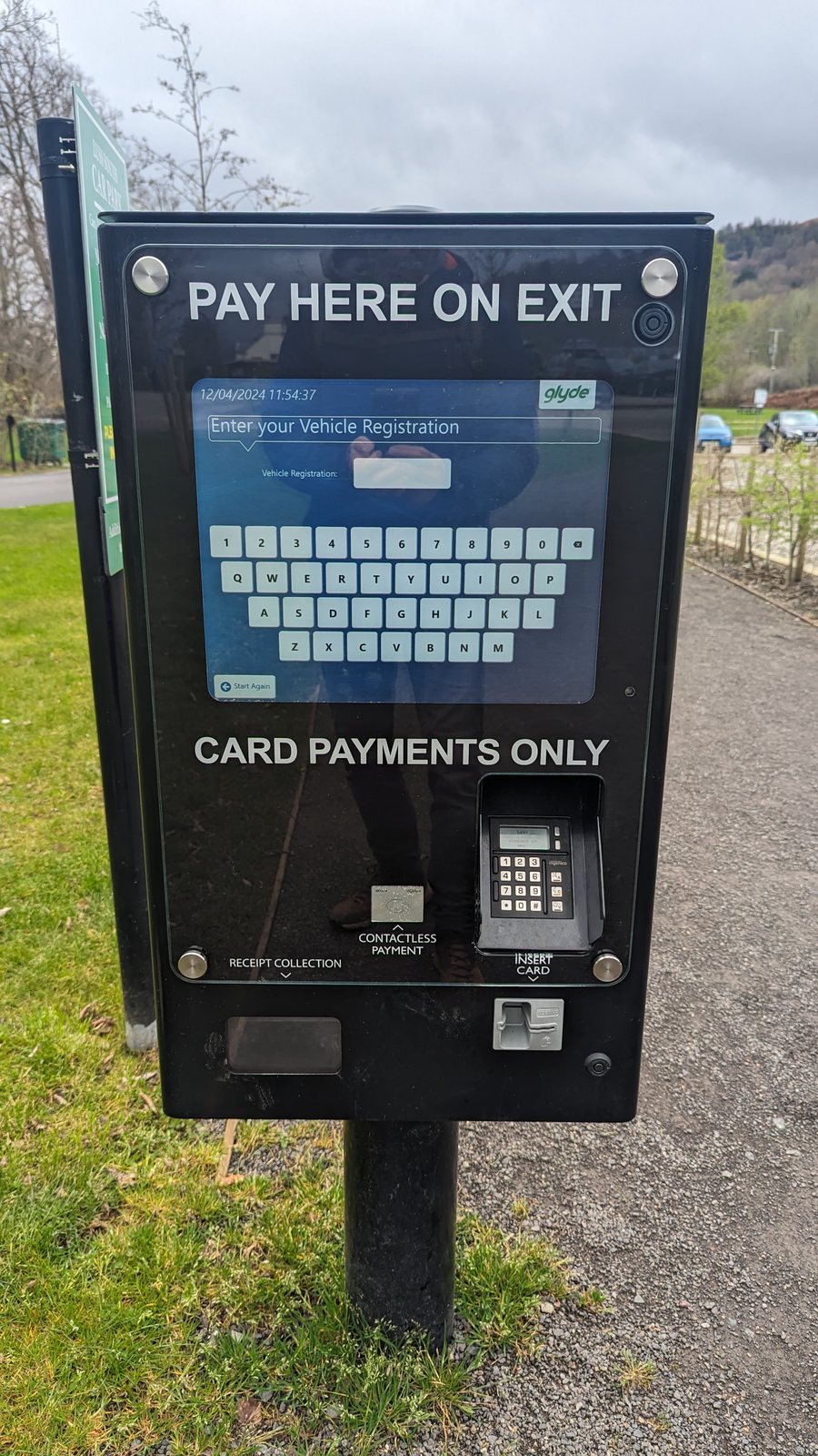 A pay-on-exit parking machine at Luss car park.