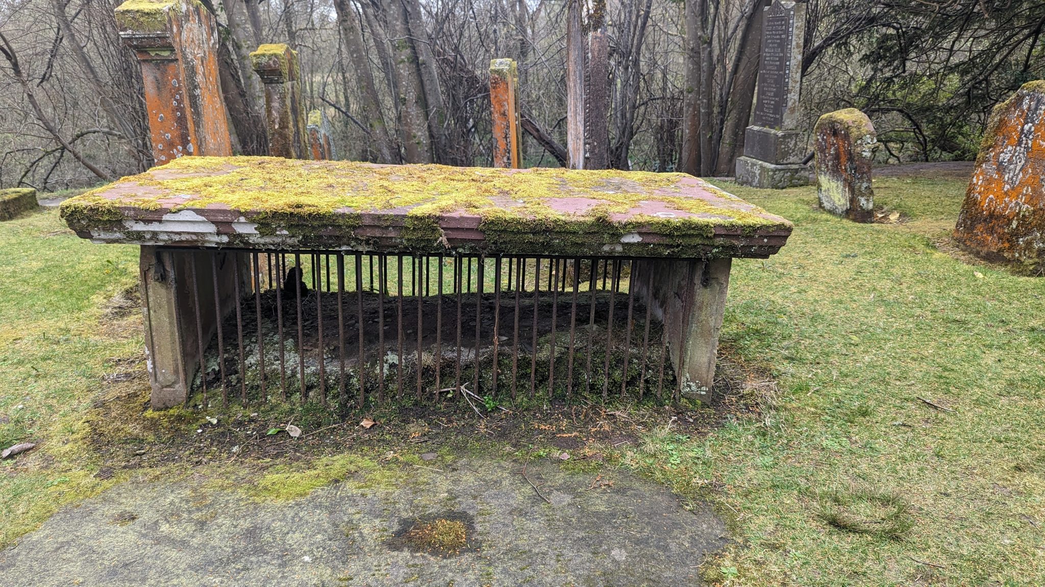 An iron mort-safe cage over a table tomb in Luss churchyard, to deter body-snatchers.