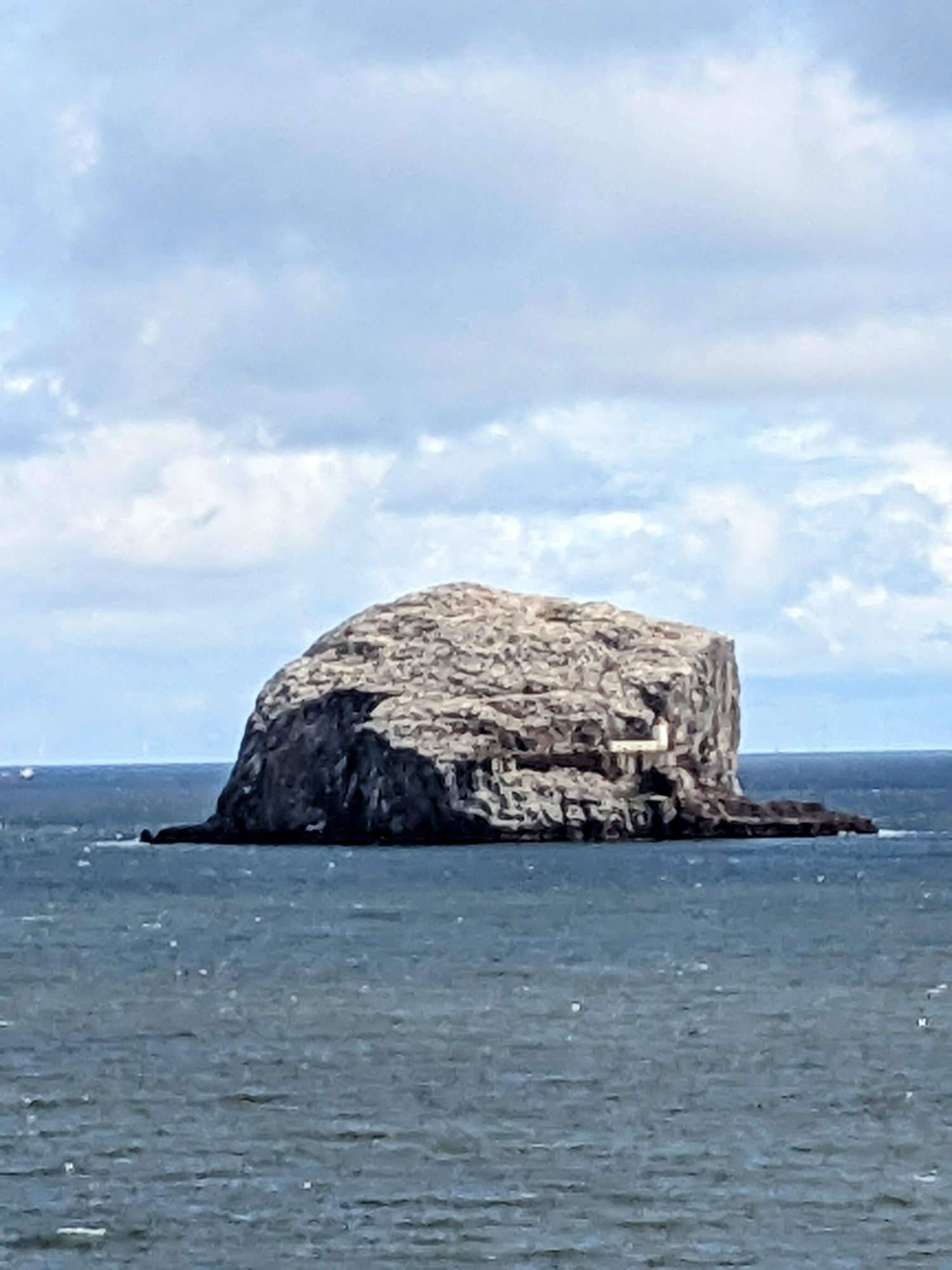 The Bass Rock rising from the sea off the North Berwick coast.