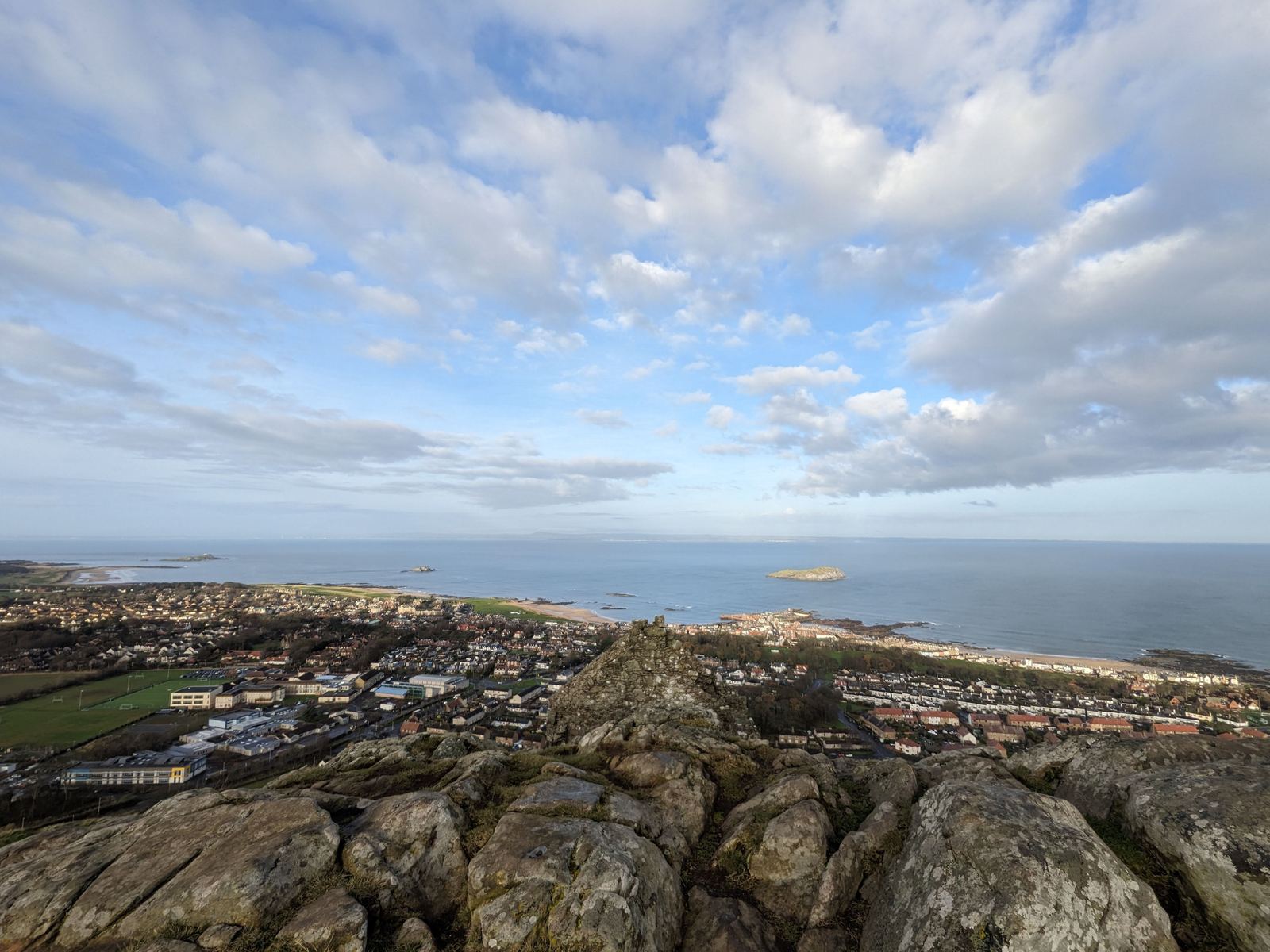 The view from the summit of North Berwick Law over the town and the Firth of Forth.