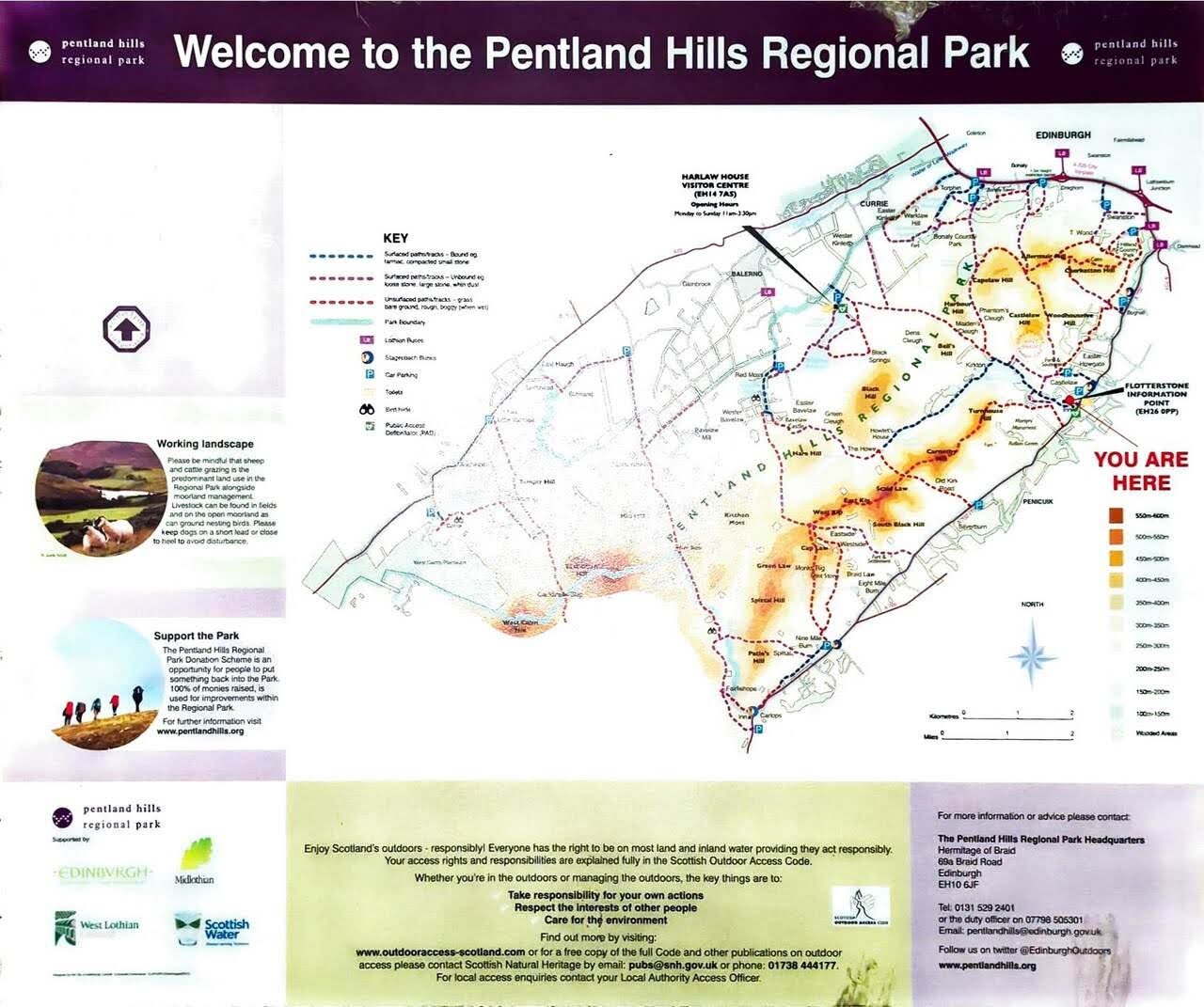 A Welcome to the Pentland Hills Regional Park information board showing a map of the paths and reservoirs.