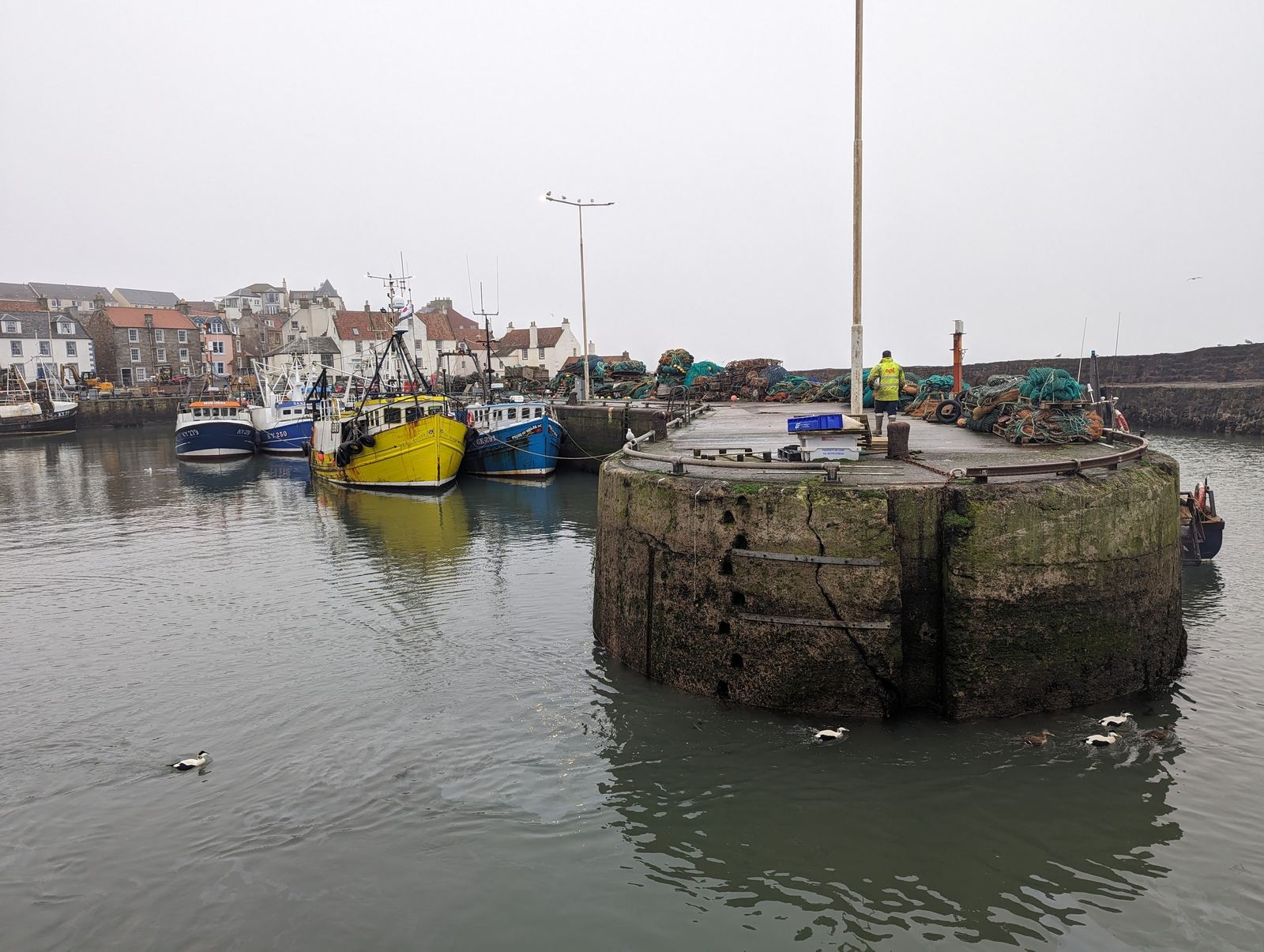 The inner harbour at Pittenweem with an old stone pier