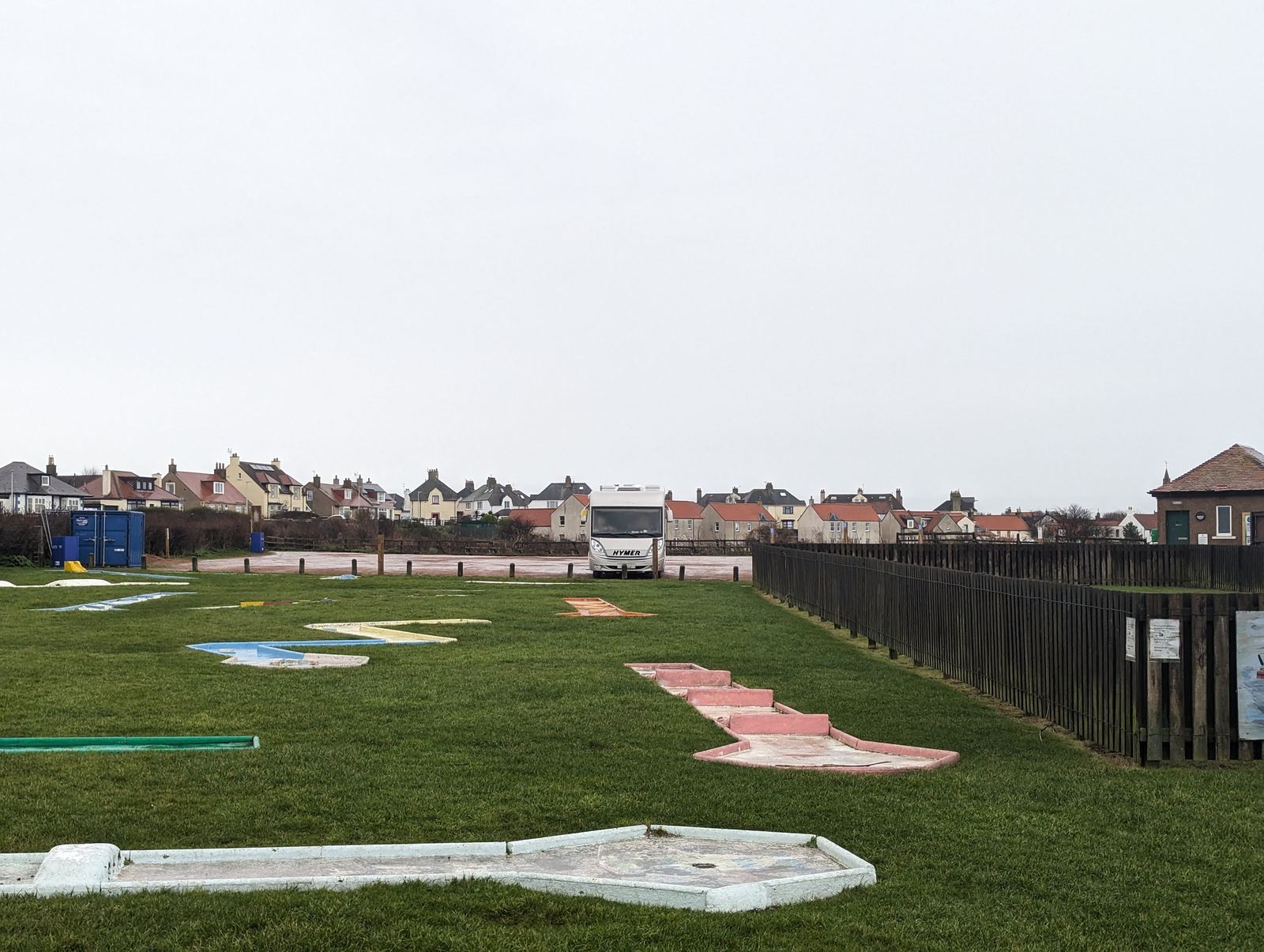 The seafront putting green at Pittenweem, the village behind