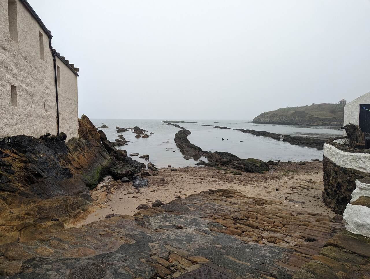 The rocky shore between the crow-stepped gables at Pittenweem
