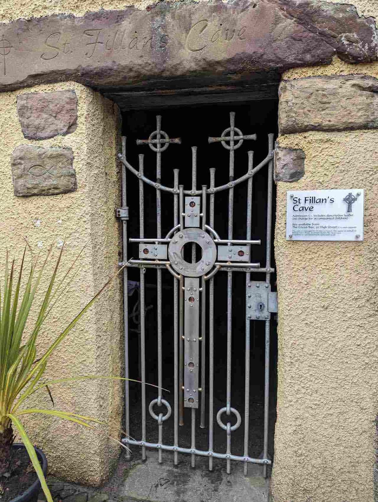The Celtic-cross iron gate and carved lintel of St Fillan's Cave, Pittenweem