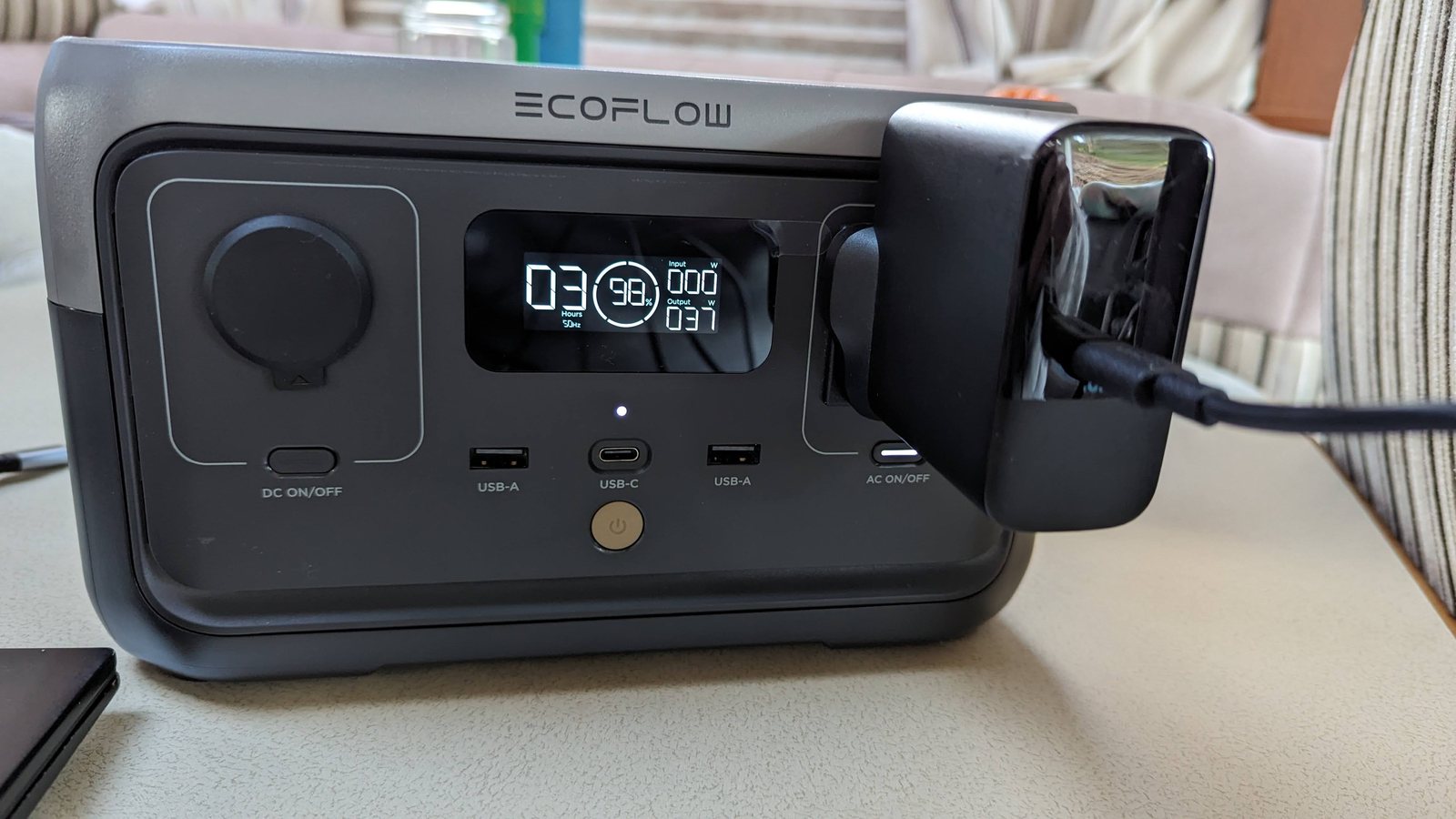 An EcoFlow portable power station on the van table.